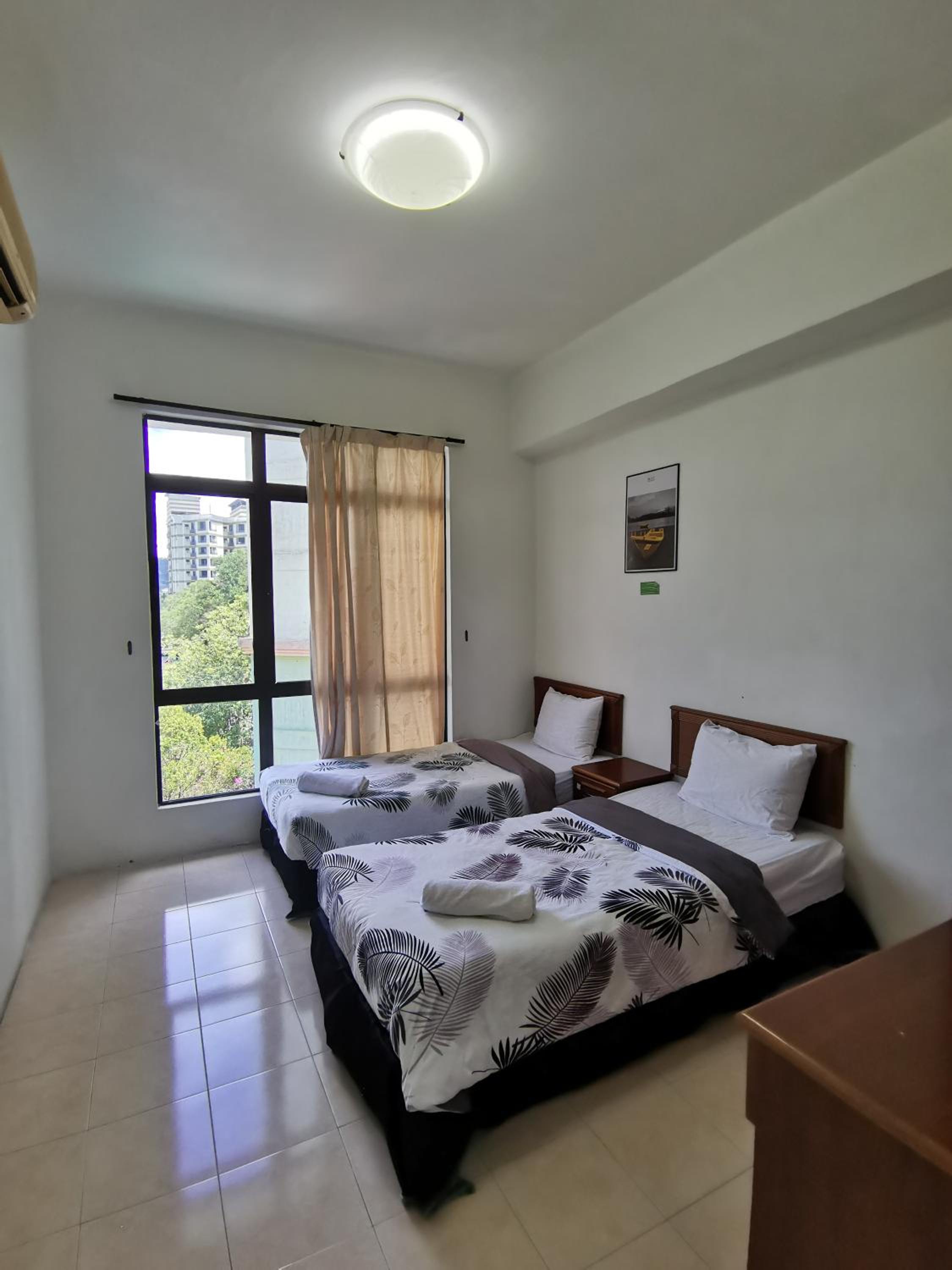 Three-Bedroom Apartment - Photo 7