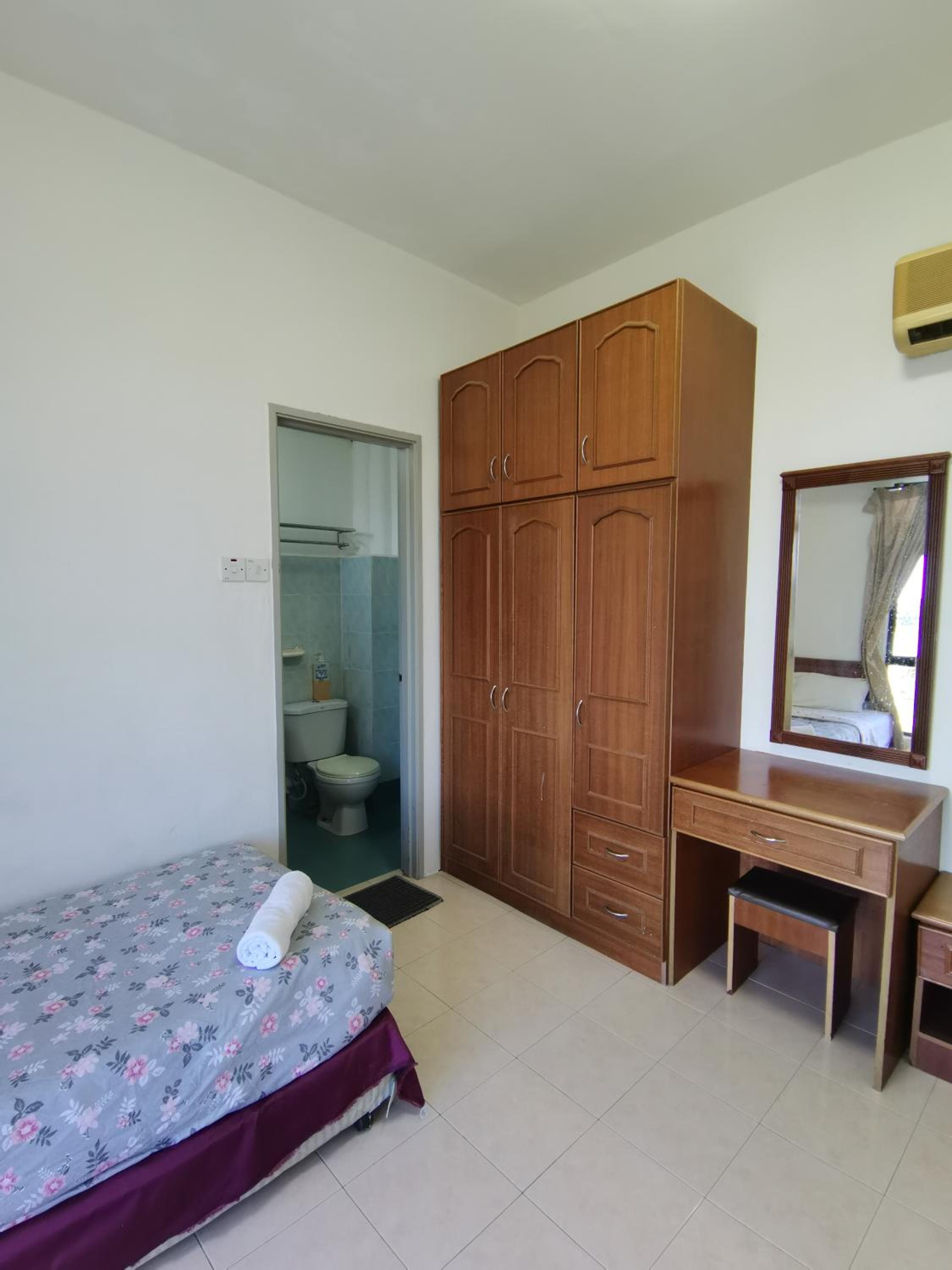 Three-Bedroom Apartment - Photo 12