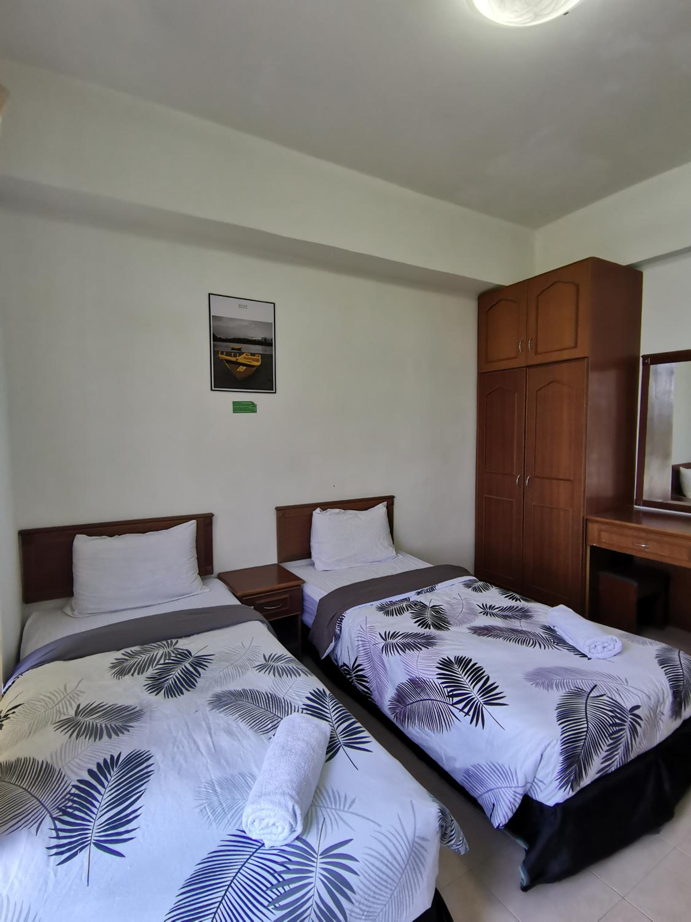 Three-Bedroom Apartment - Photo 13