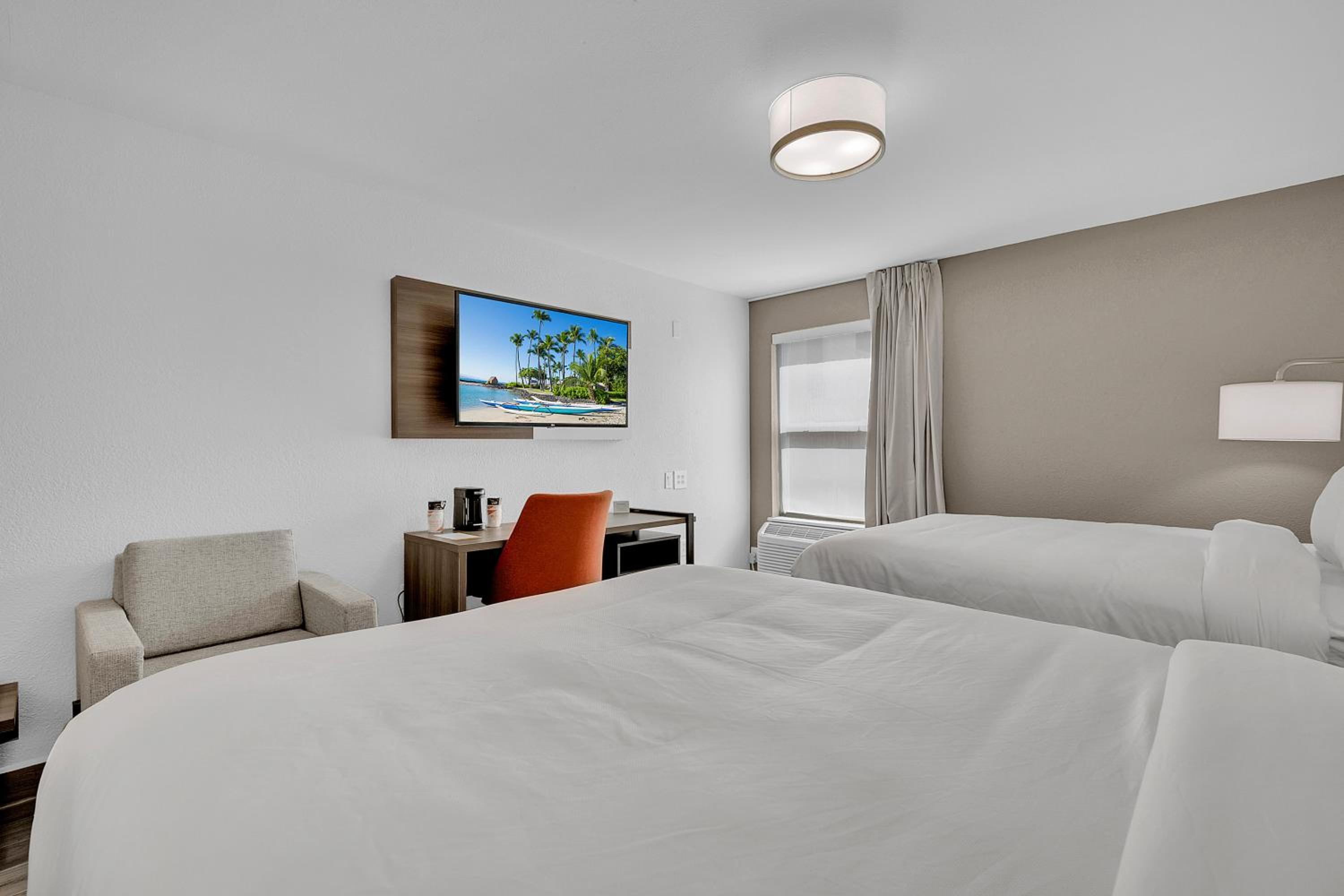Queen Room with Two Queen Beds - Photo 1