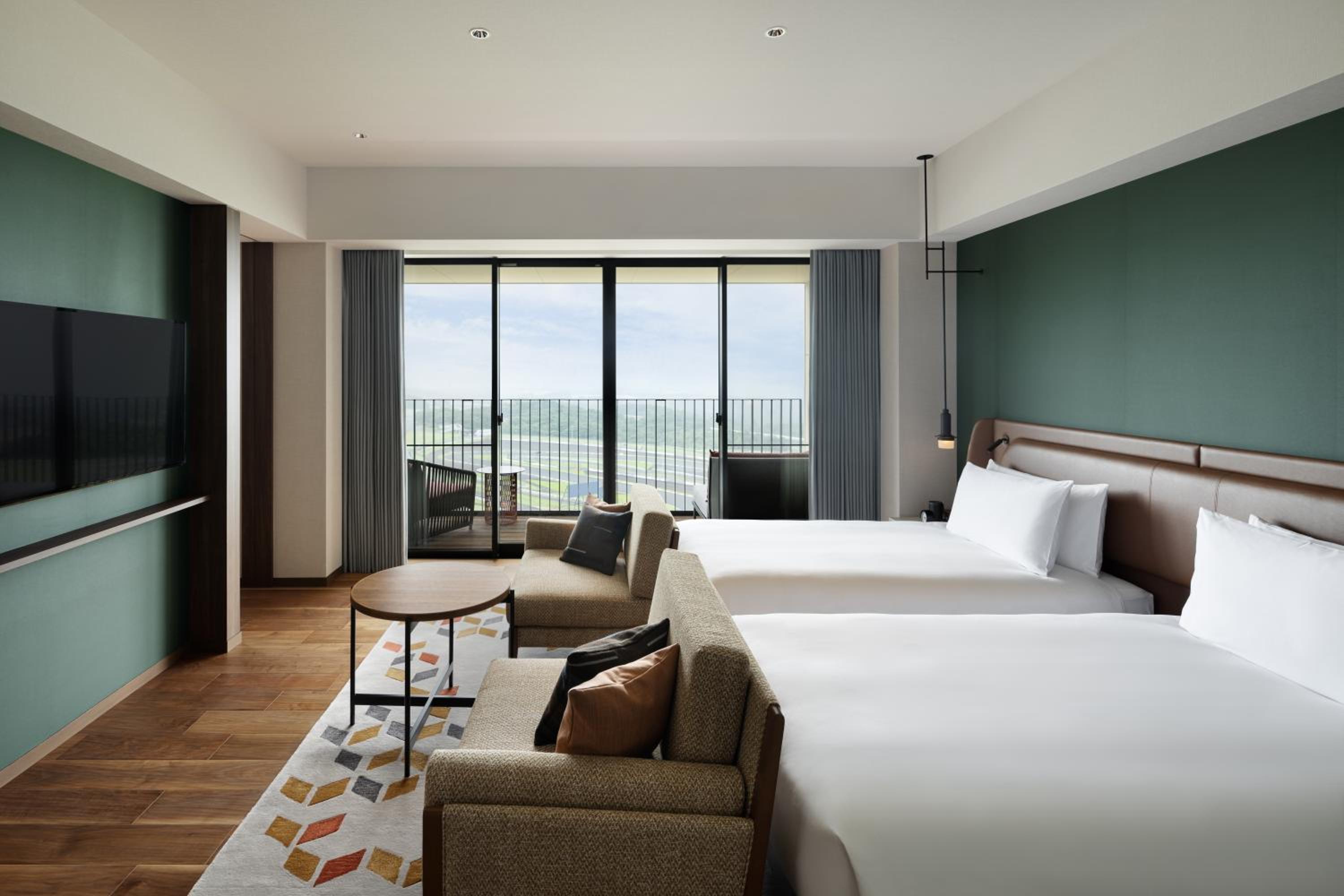 Grand Prix Suite with Two Single Beds and Circuit View