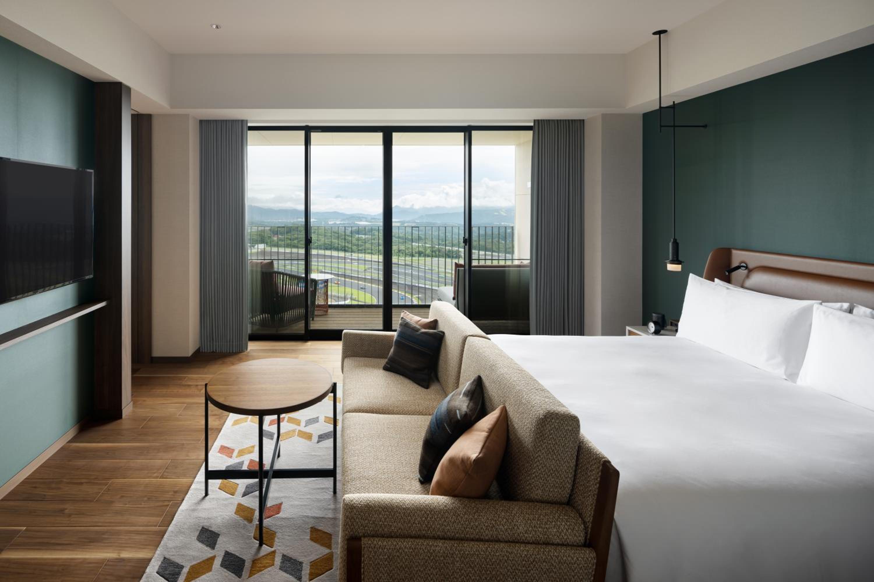 Grand Prix Suite with One King Bed and Circuit View