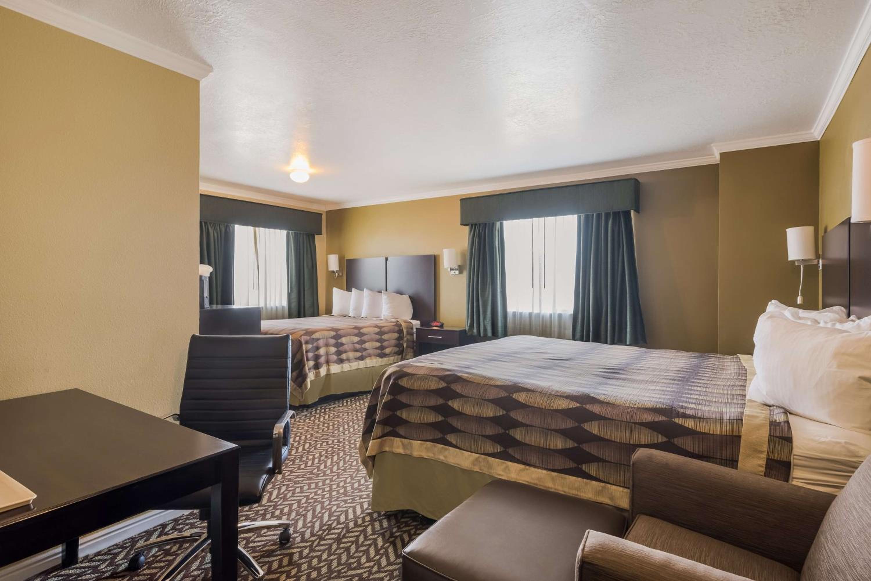 Suite with One King and One Queen Bed - Non-Smoking - Photo 1