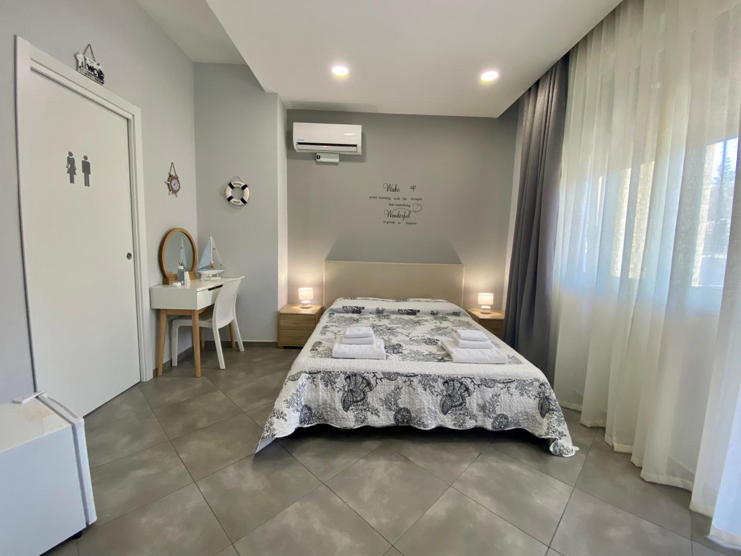 Double Room with Balcony (2 Adults + 1 Child)