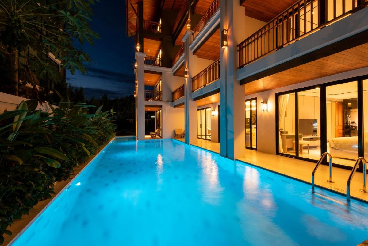 Deluxe Family Suite - Photo 17