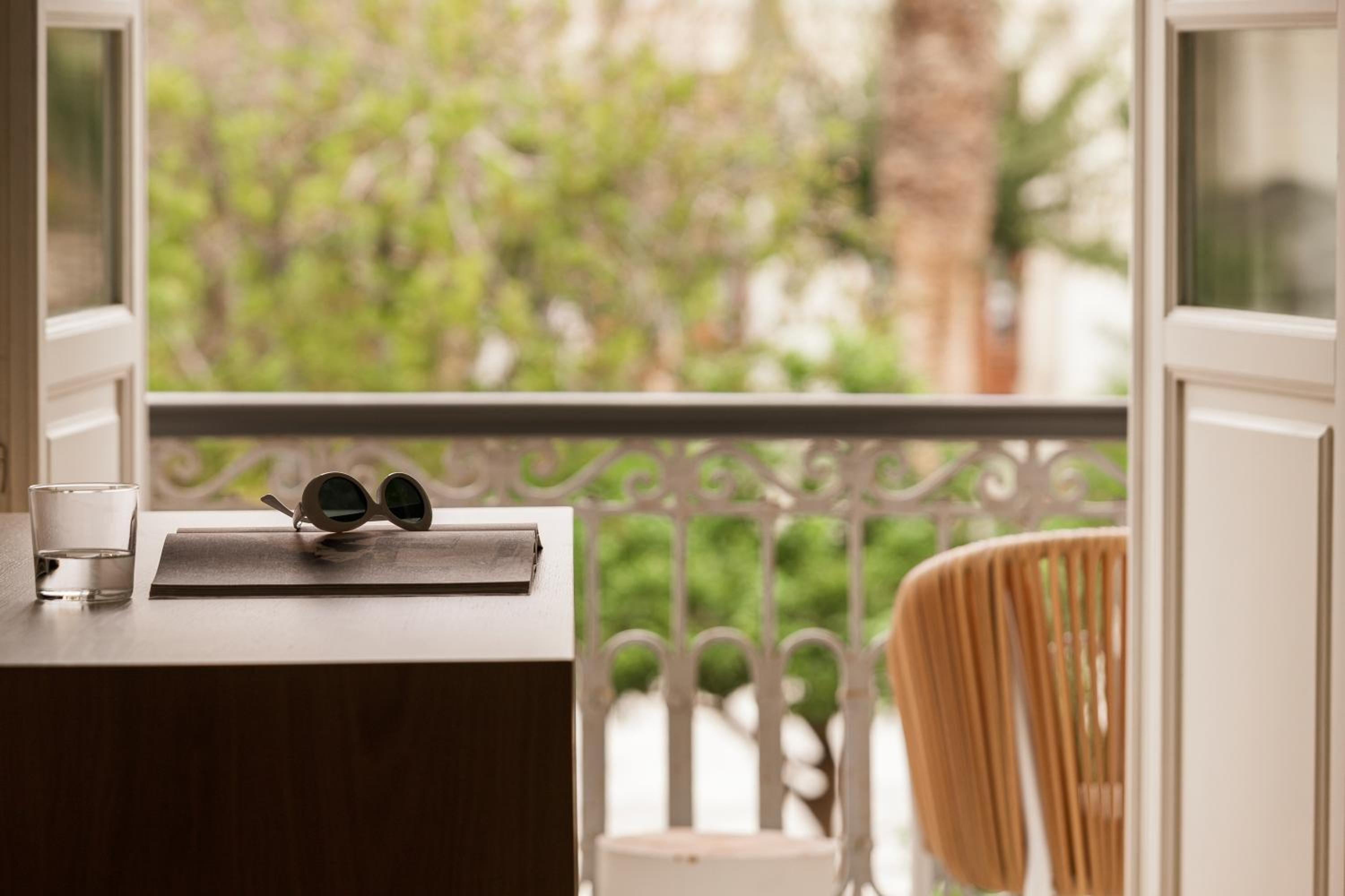 Signature Suite with Balcony & City View photo 2
