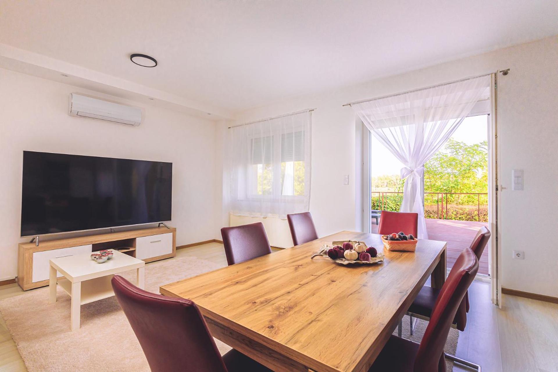 Three-Bedroom Apartment - Photo 41