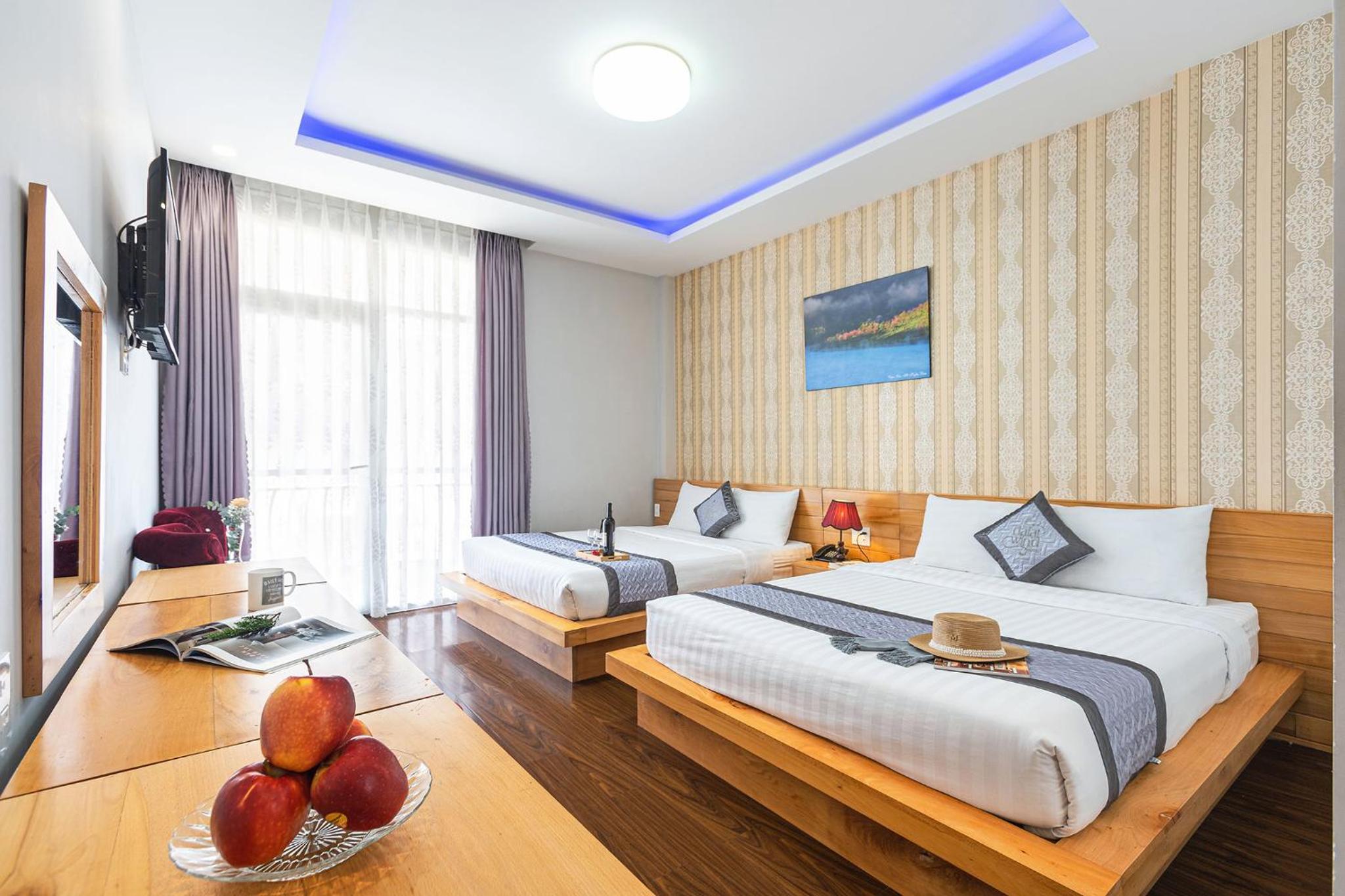 Deluxe Queen Room with Two Queen Beds photo 3