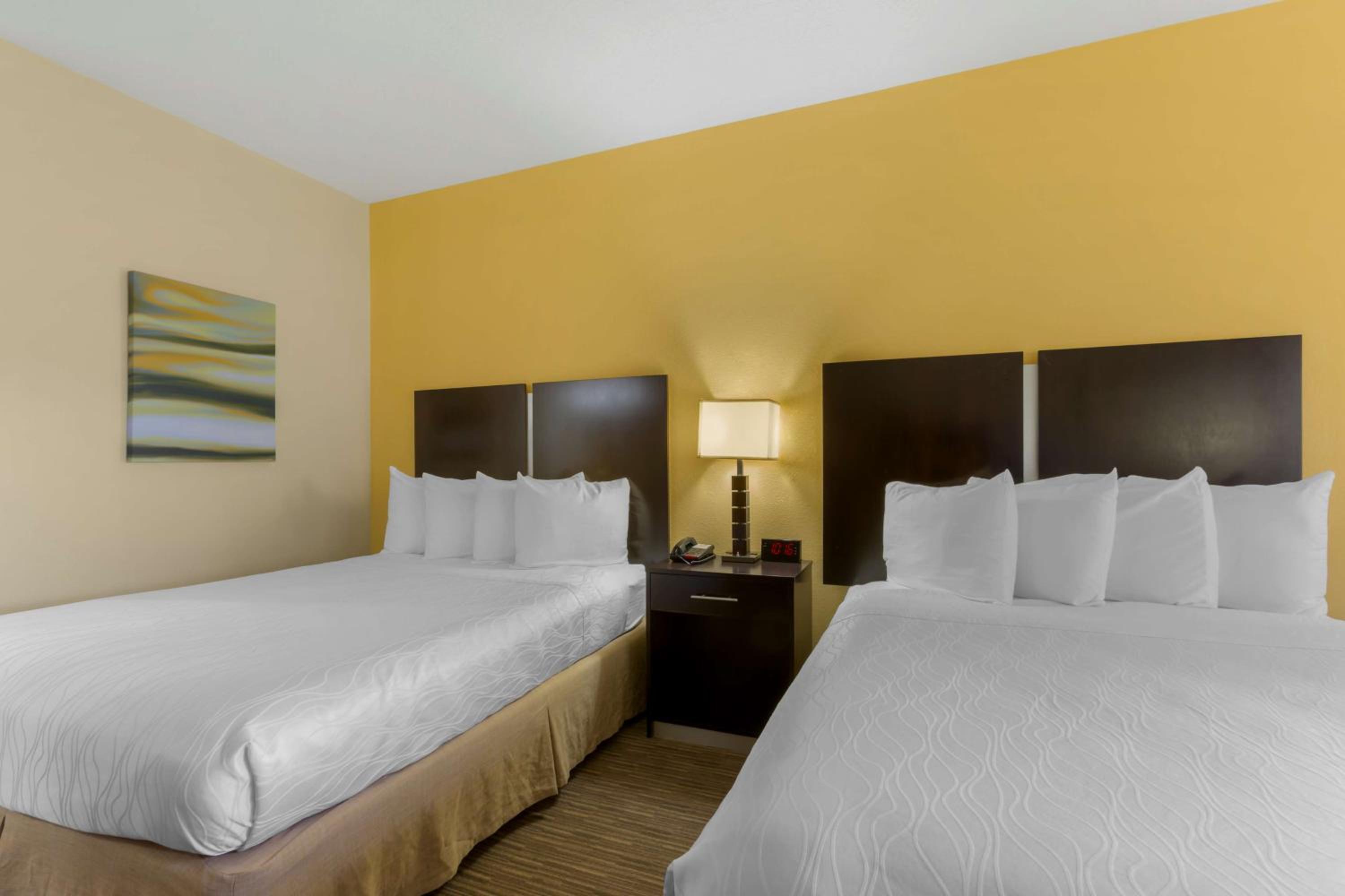 Queen Room with Two Queen Beds - Photo 1