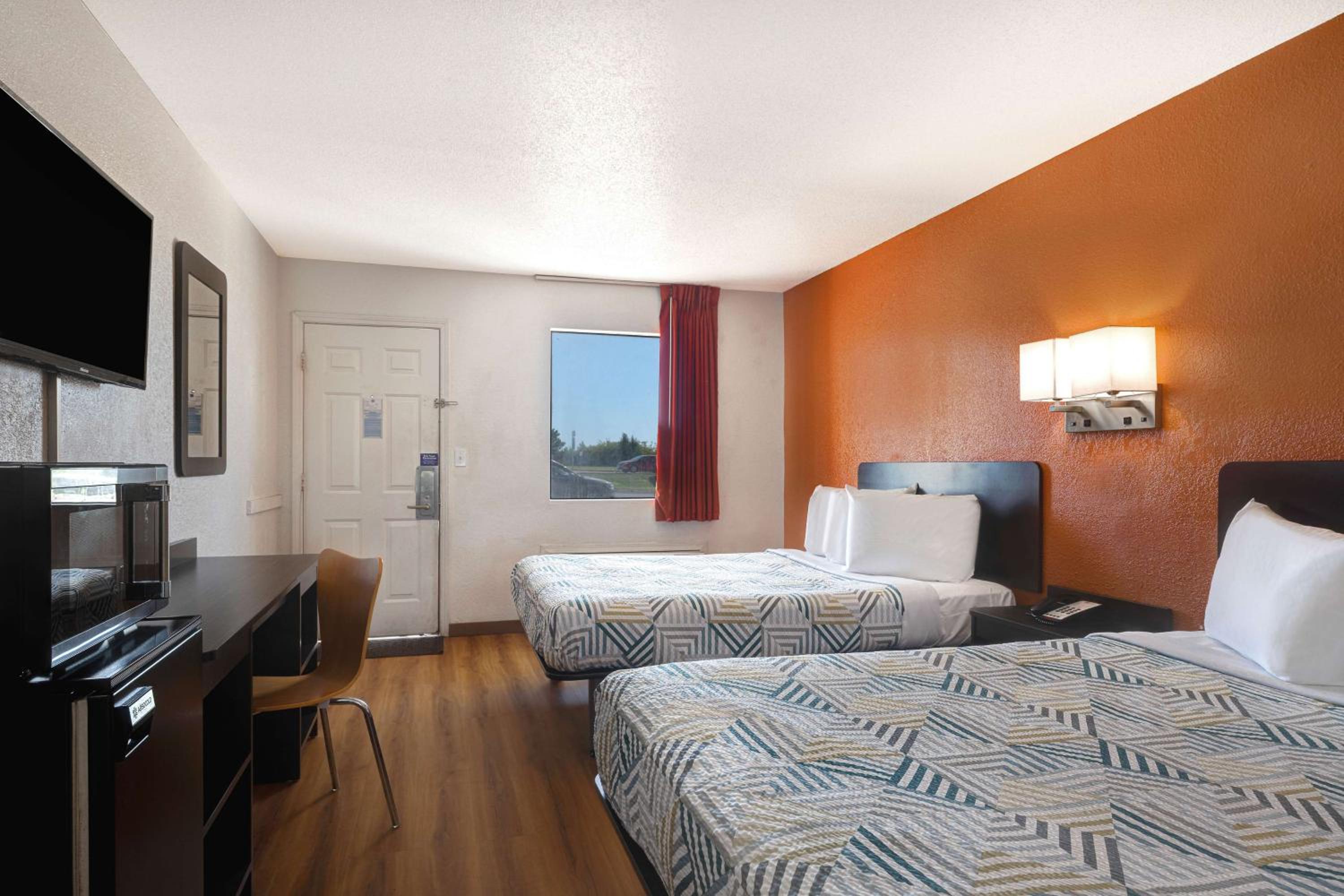 Deluxe Queen Room with Two Queen Beds - Non-Smoking photo 1