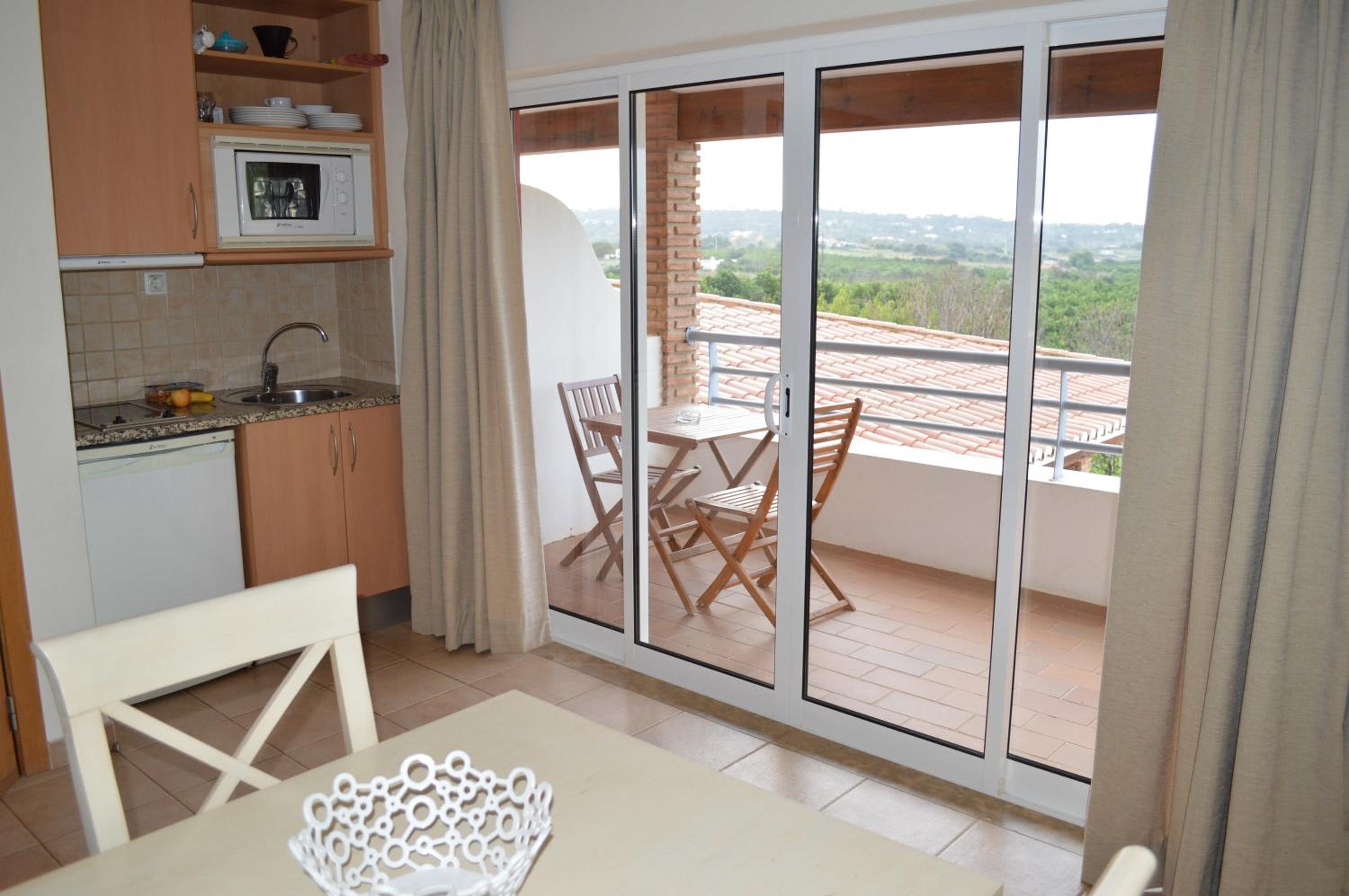 One-Bedroom Apartment with Pool View (2 Adults + 2 Children)  photo 2