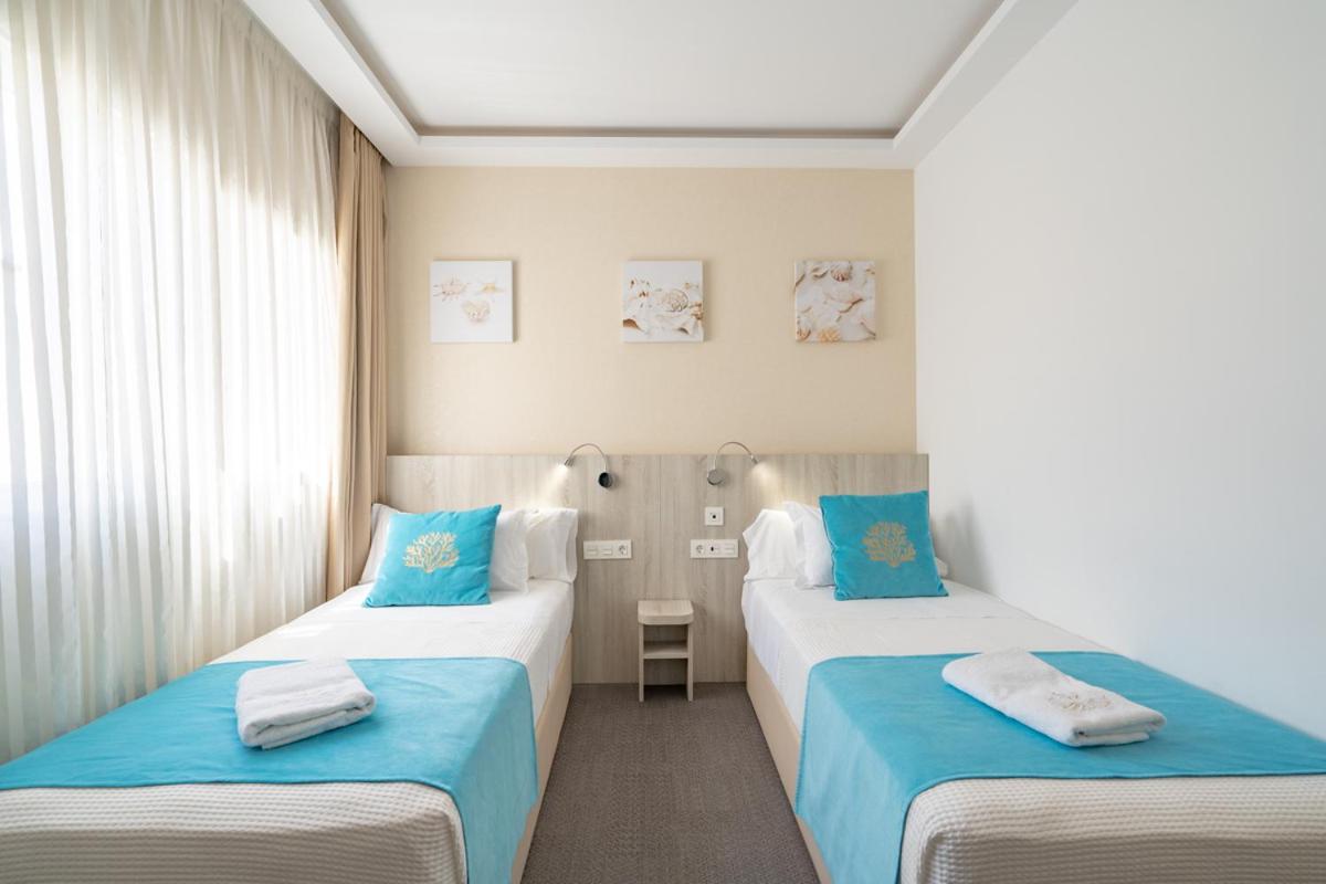 Standard Twin Room - Photo 3