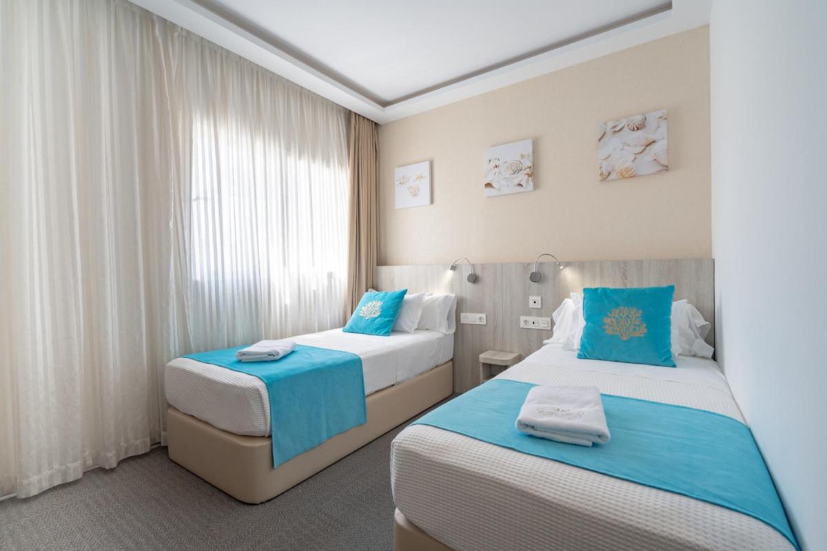 Standard Twin Room - Photo 4