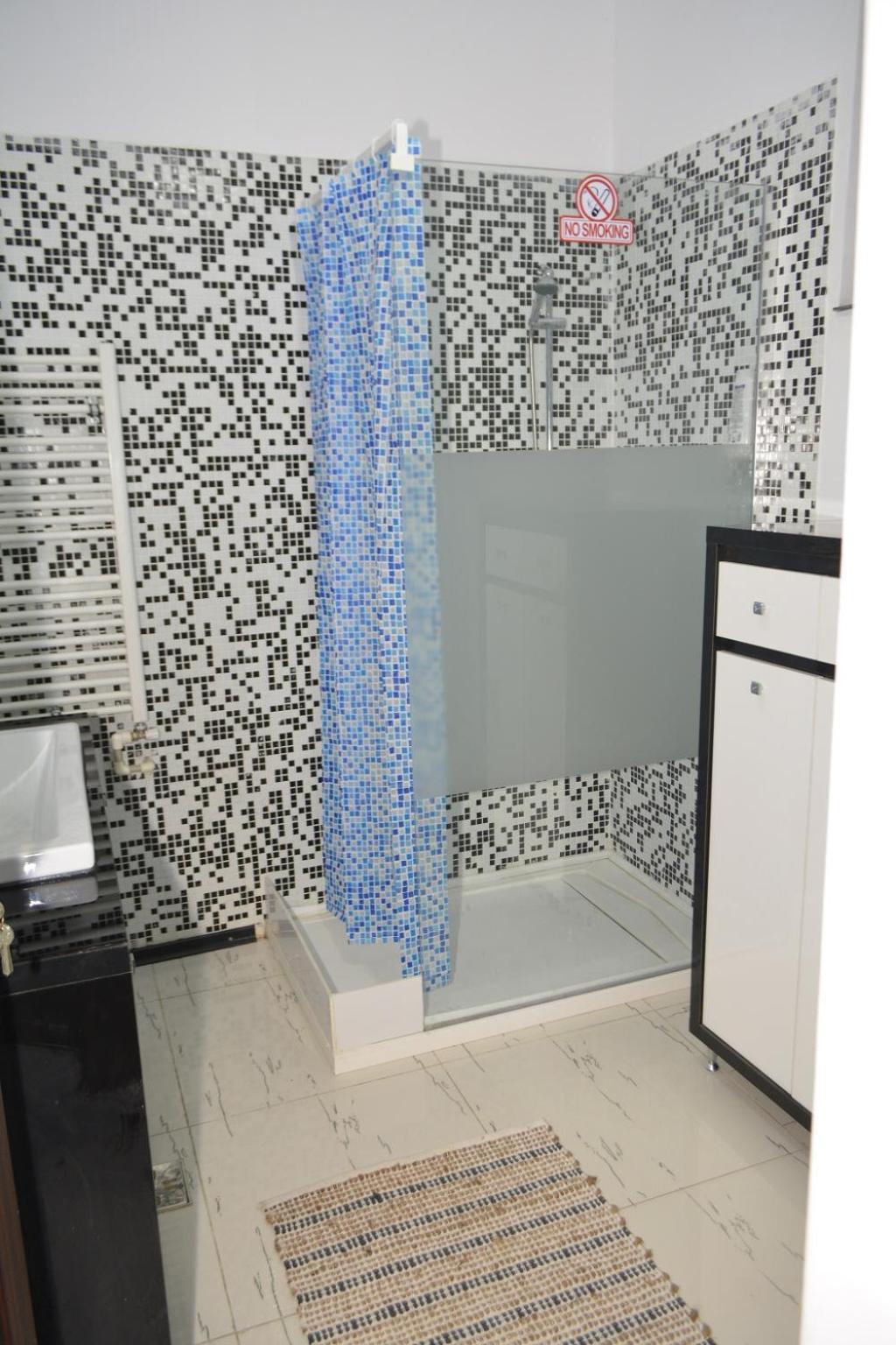 Two-Bedroom Apartment - Photo 23