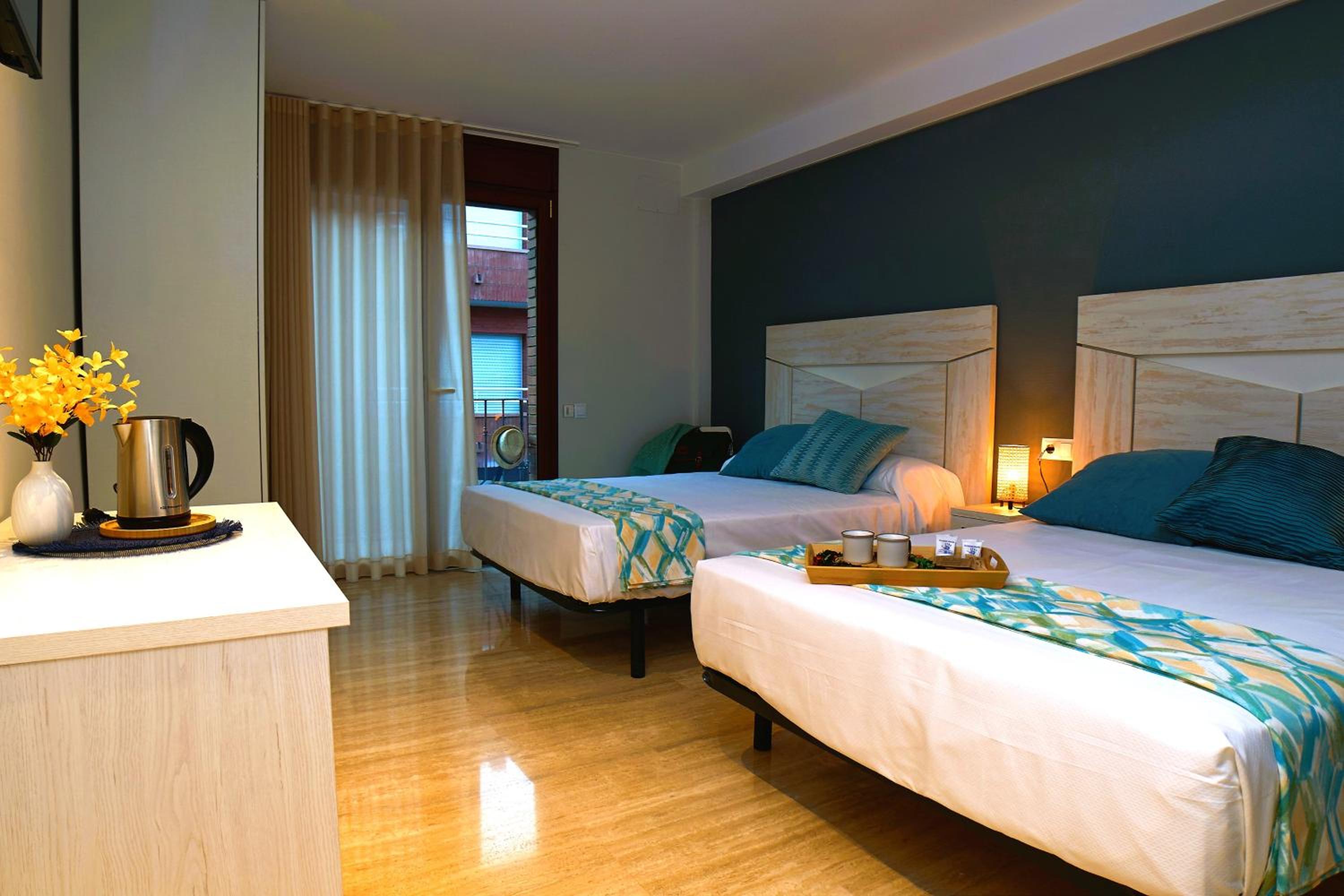 Habitación Doble con Dos Camas Dobles