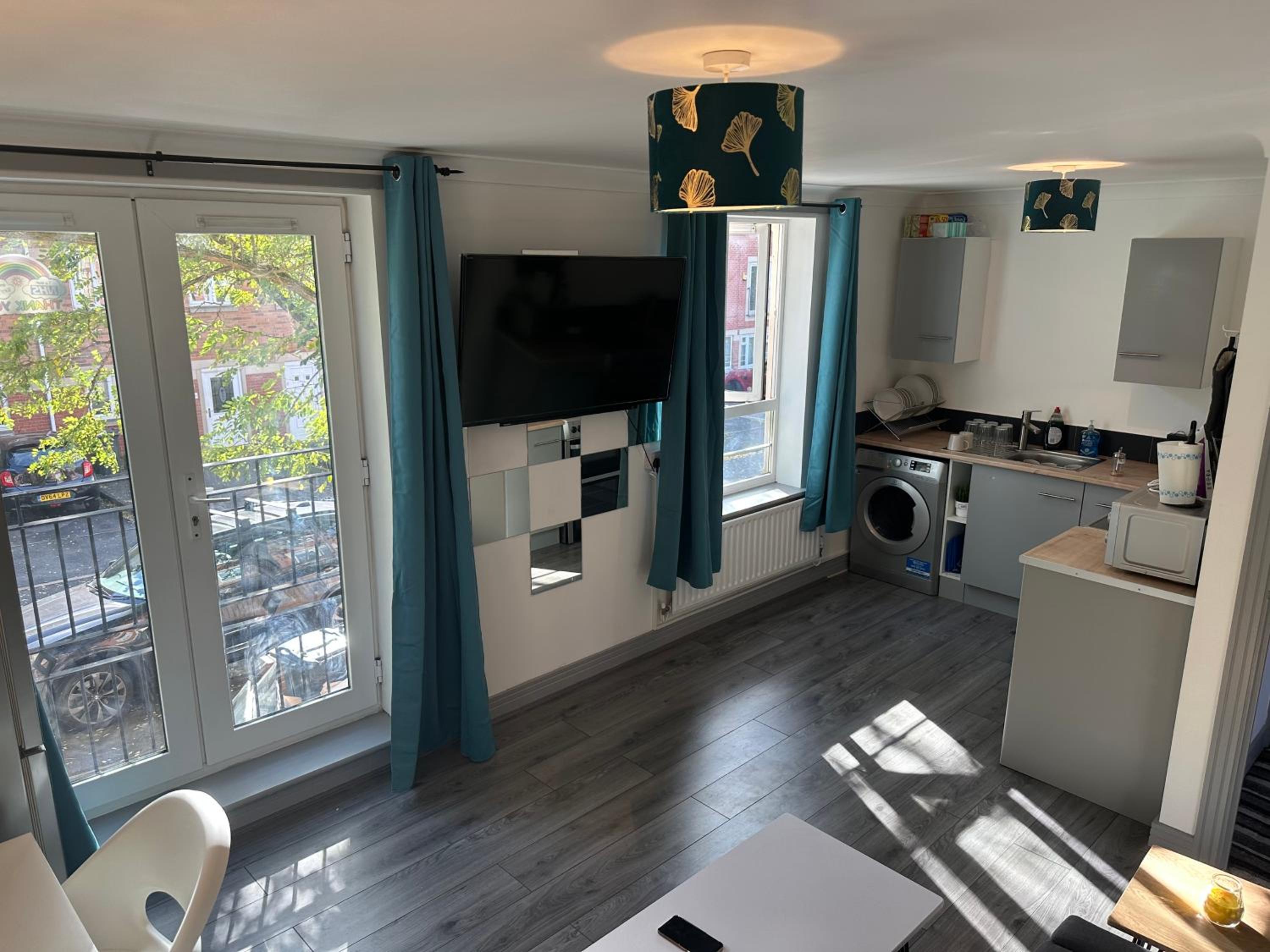 Three-Bedroom Apartment - Photo 40