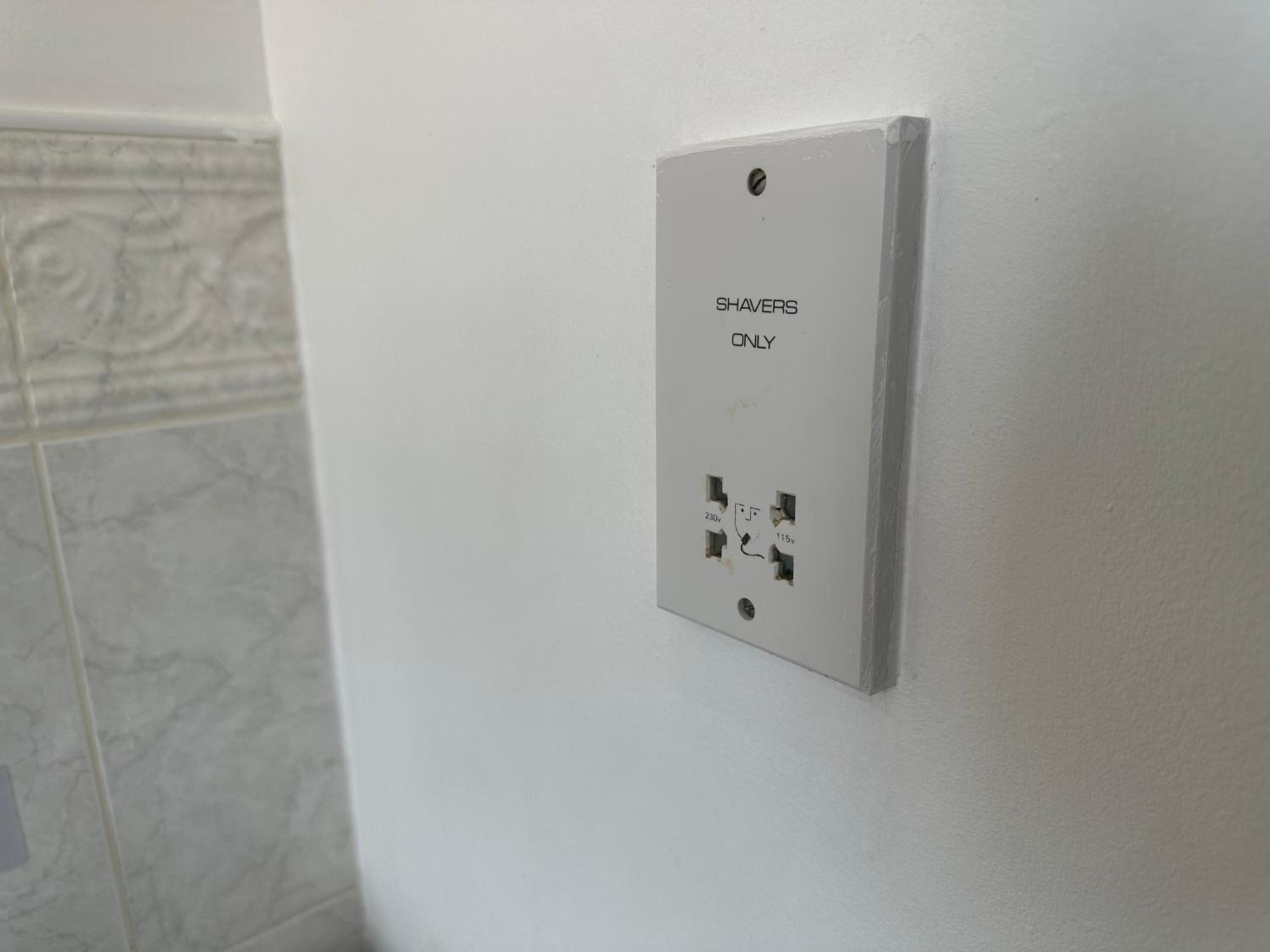 Three-Bedroom Apartment - Photo 43