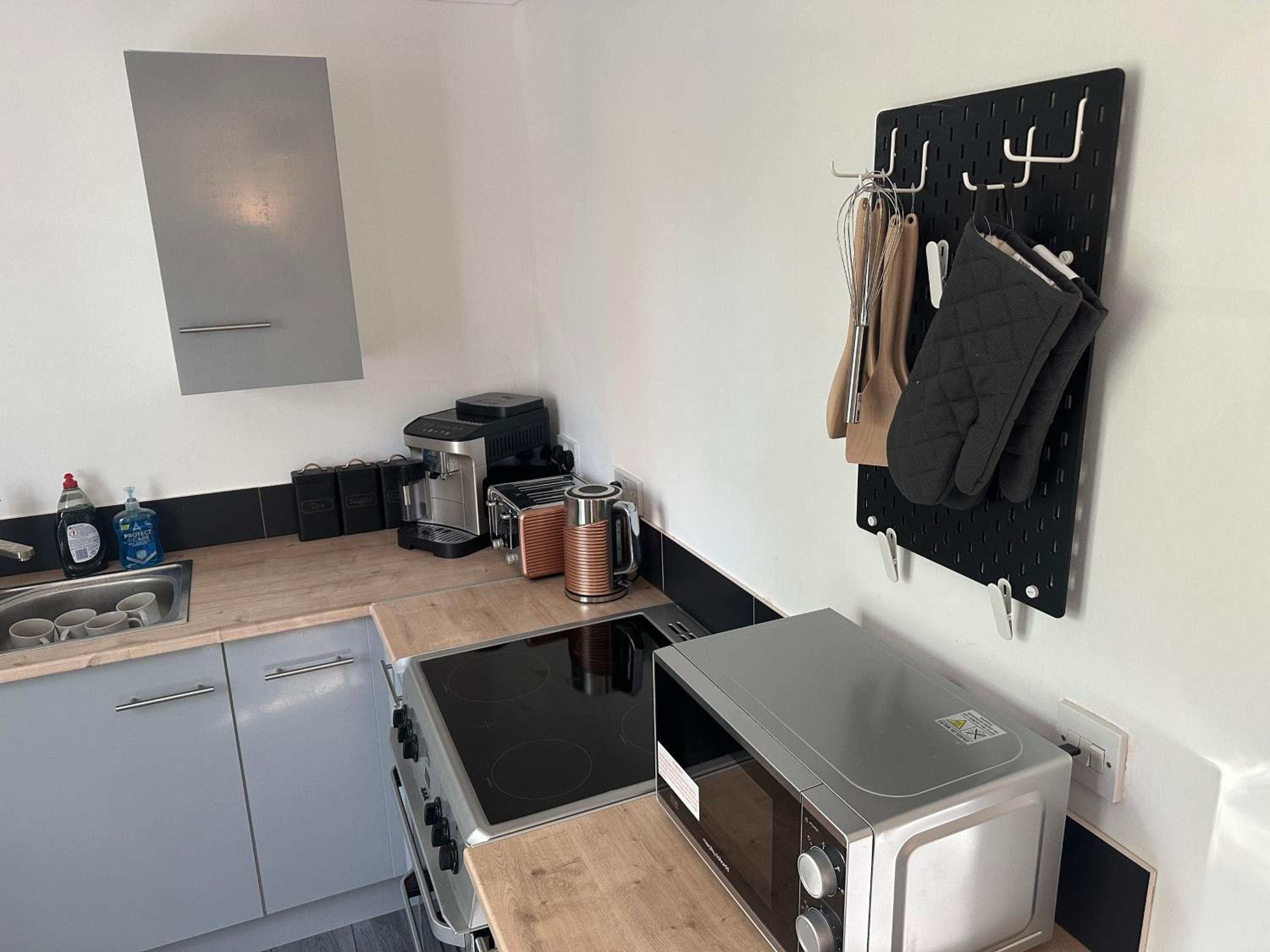Three-Bedroom Apartment - Photo 66