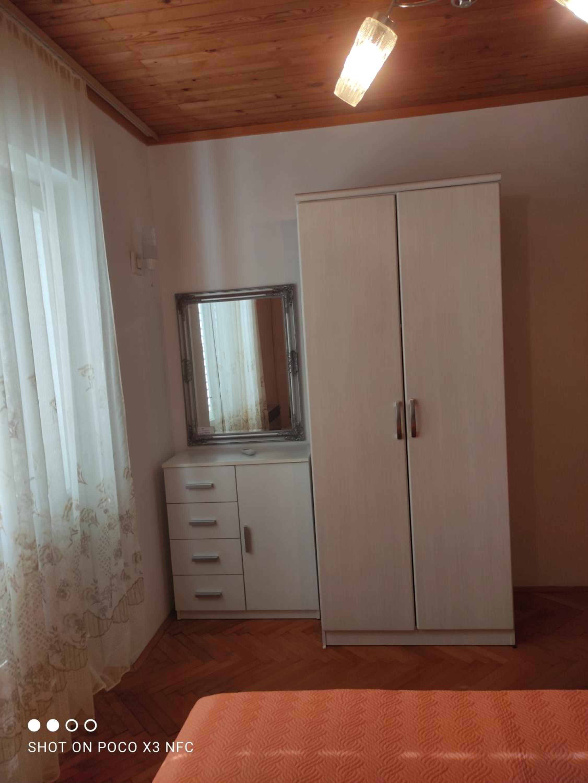 Three-Bedroom Apartment with Terrace - Photo 8