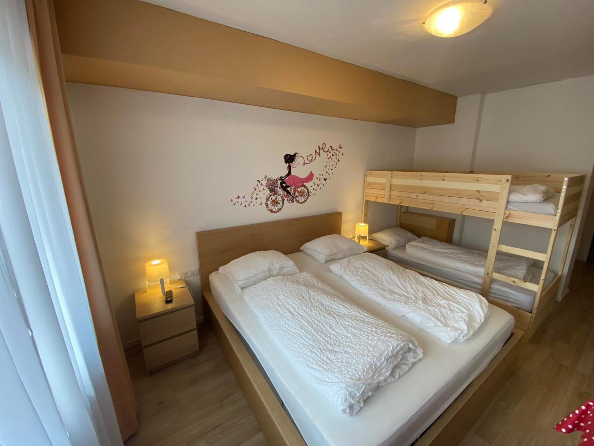 Quadruple Room with Balcony - Photo 14
