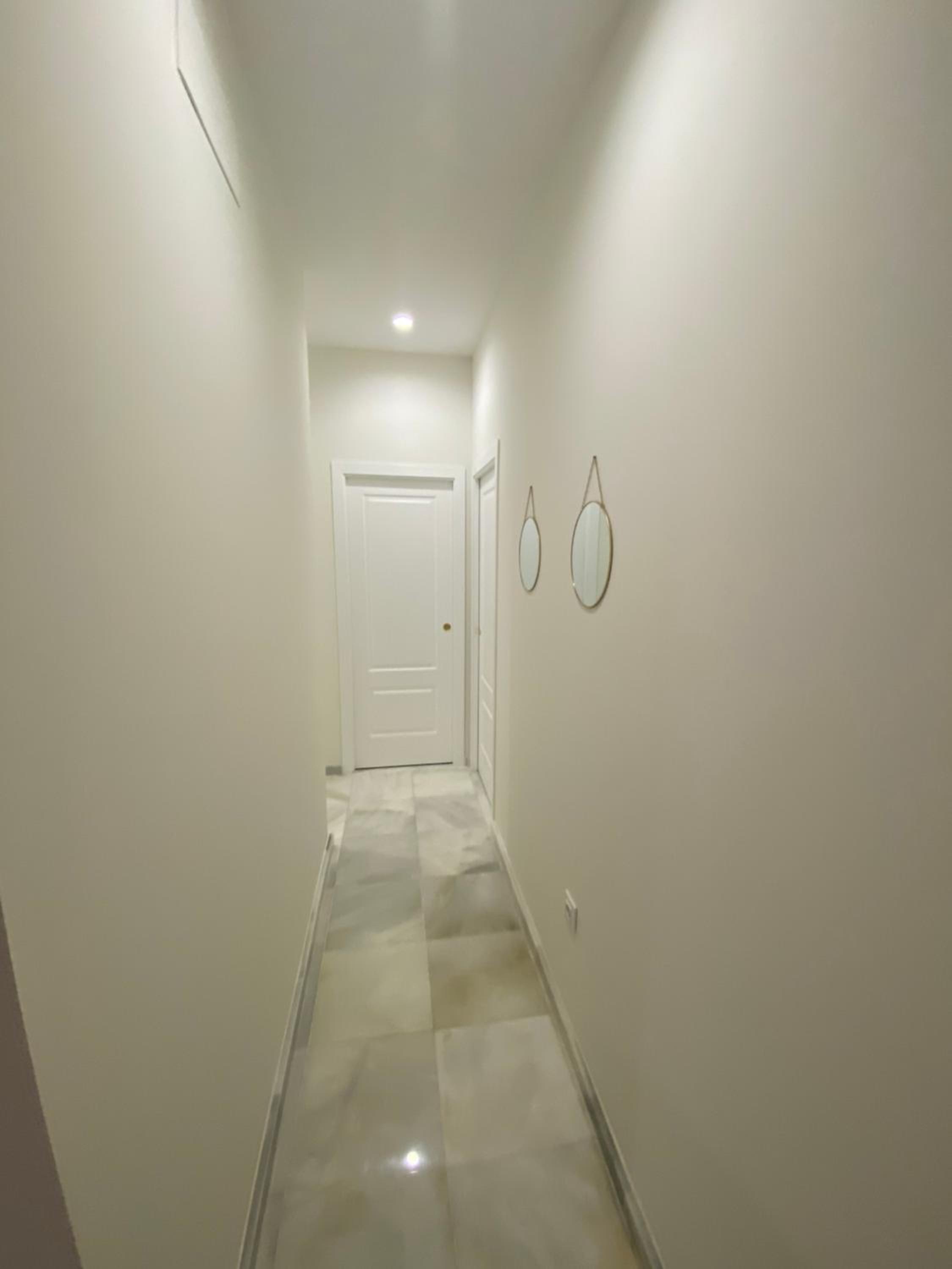 Three-Bedroom Apartment photo 2