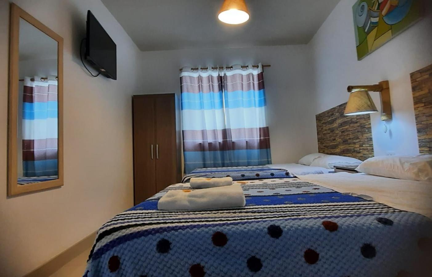 Quadruple Room with Private Bathroom photo 3