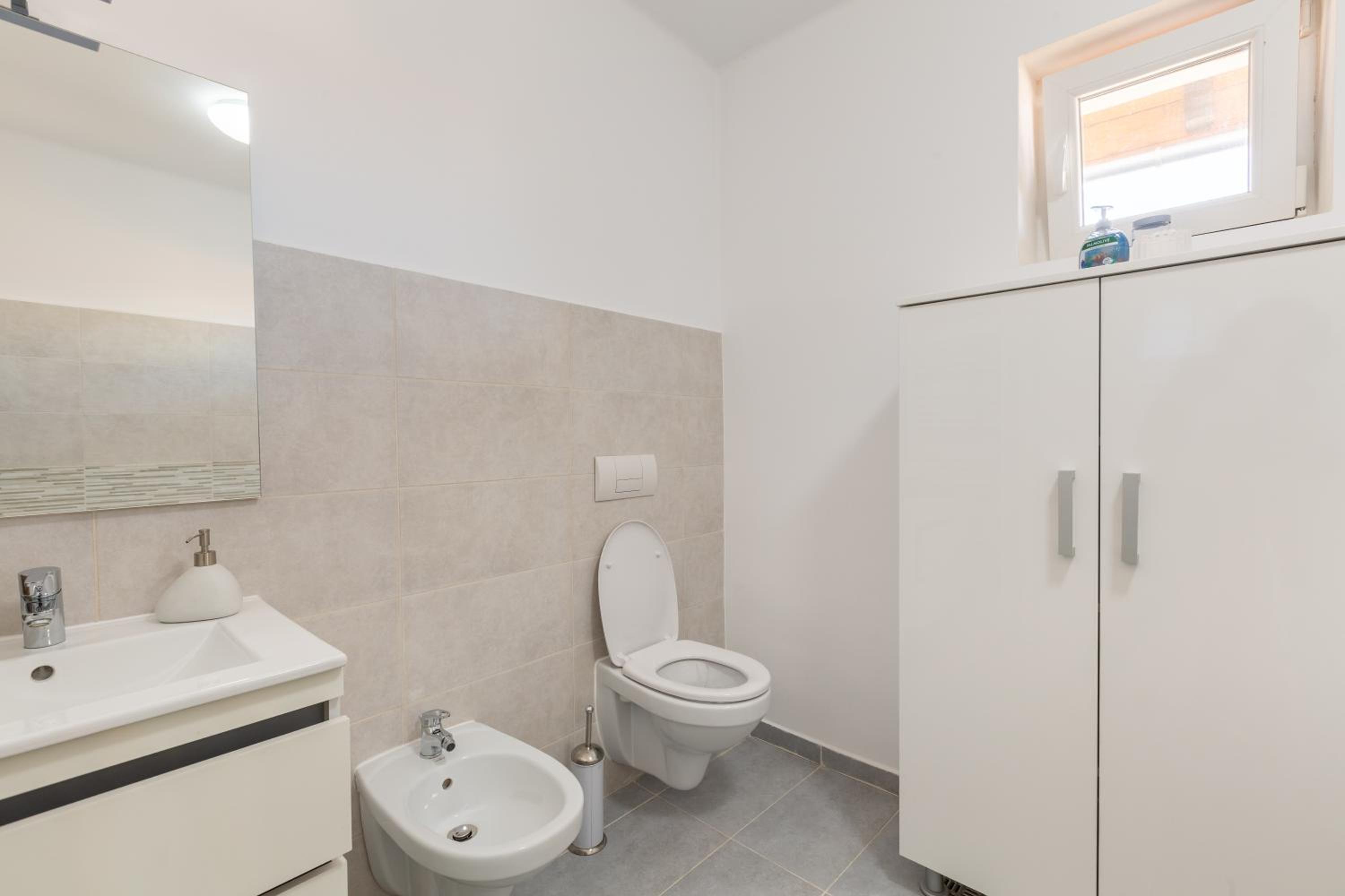 Three-Bedroom House - Photo 18