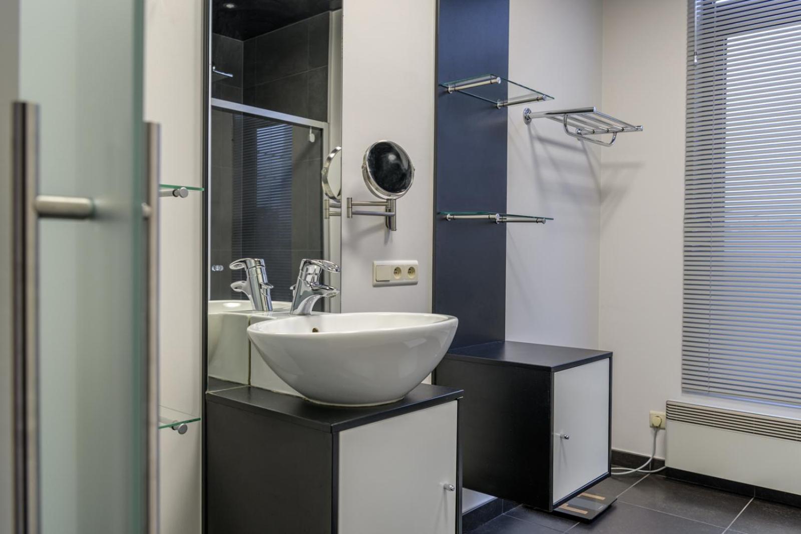 Three-Bedroom Apartment - Photo 23