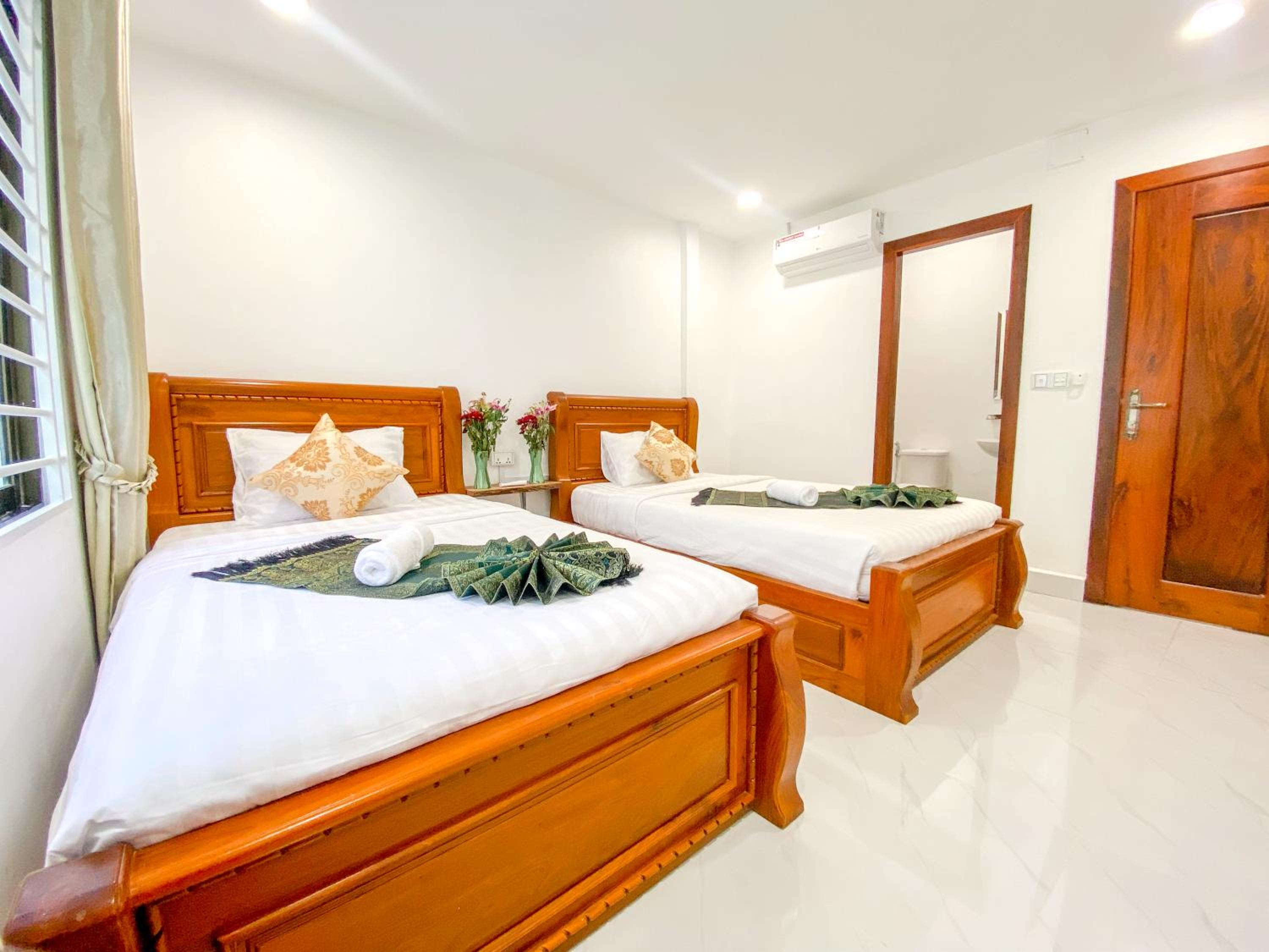 Deluxe Twin Room - Photo 13