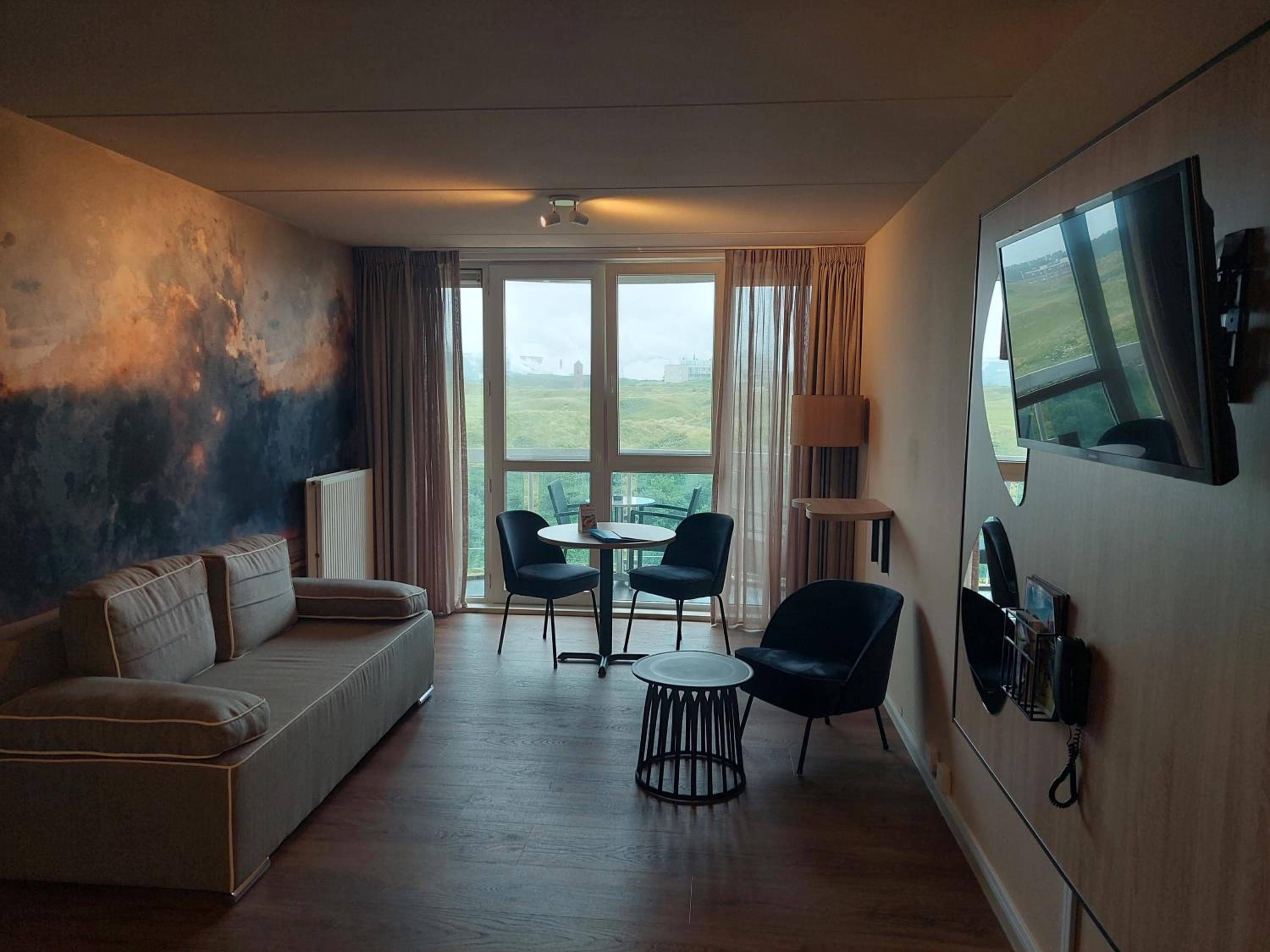 Family Room with Balcony - Photo 1