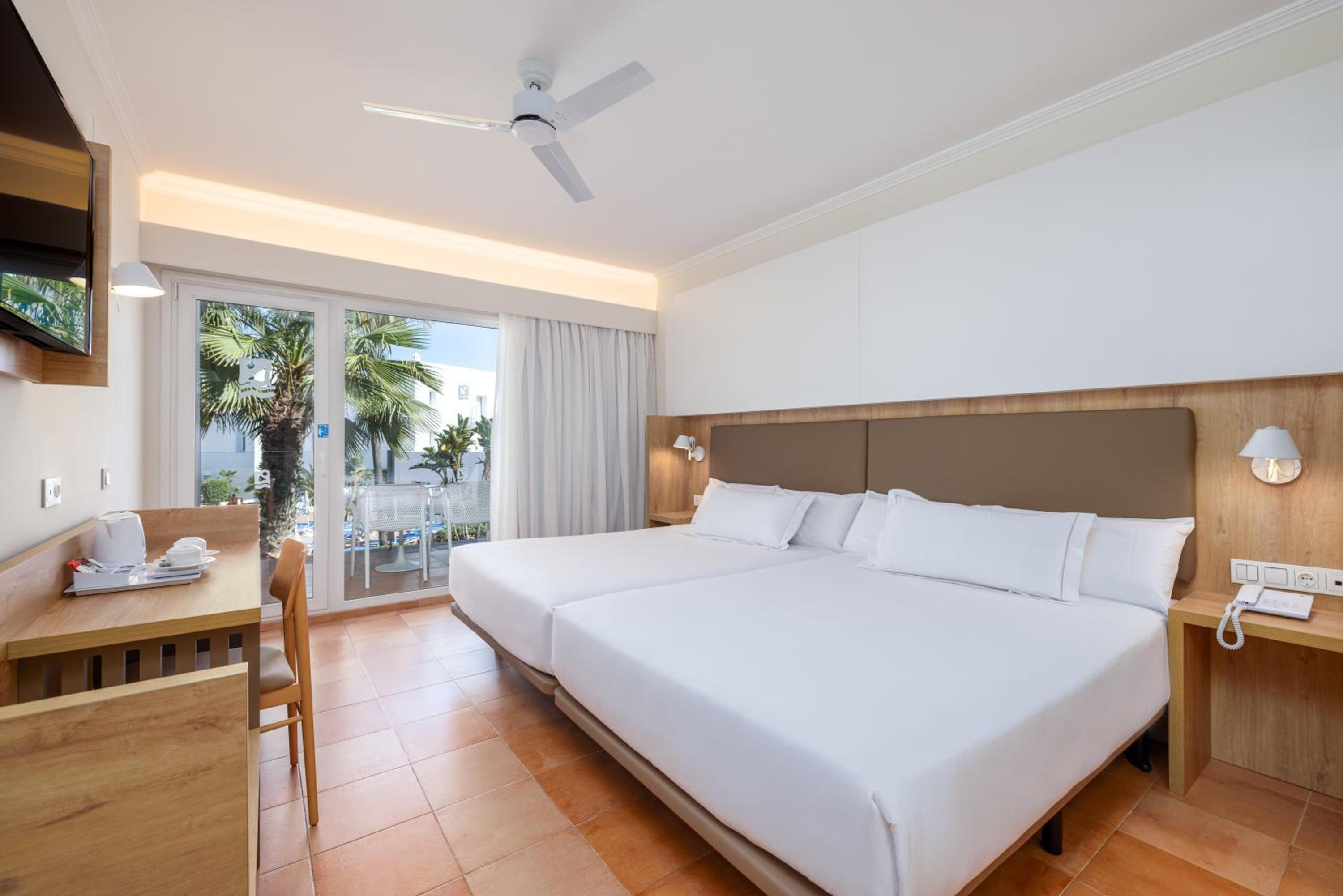 Habitación Doble Superior con Dos Camas Dobles