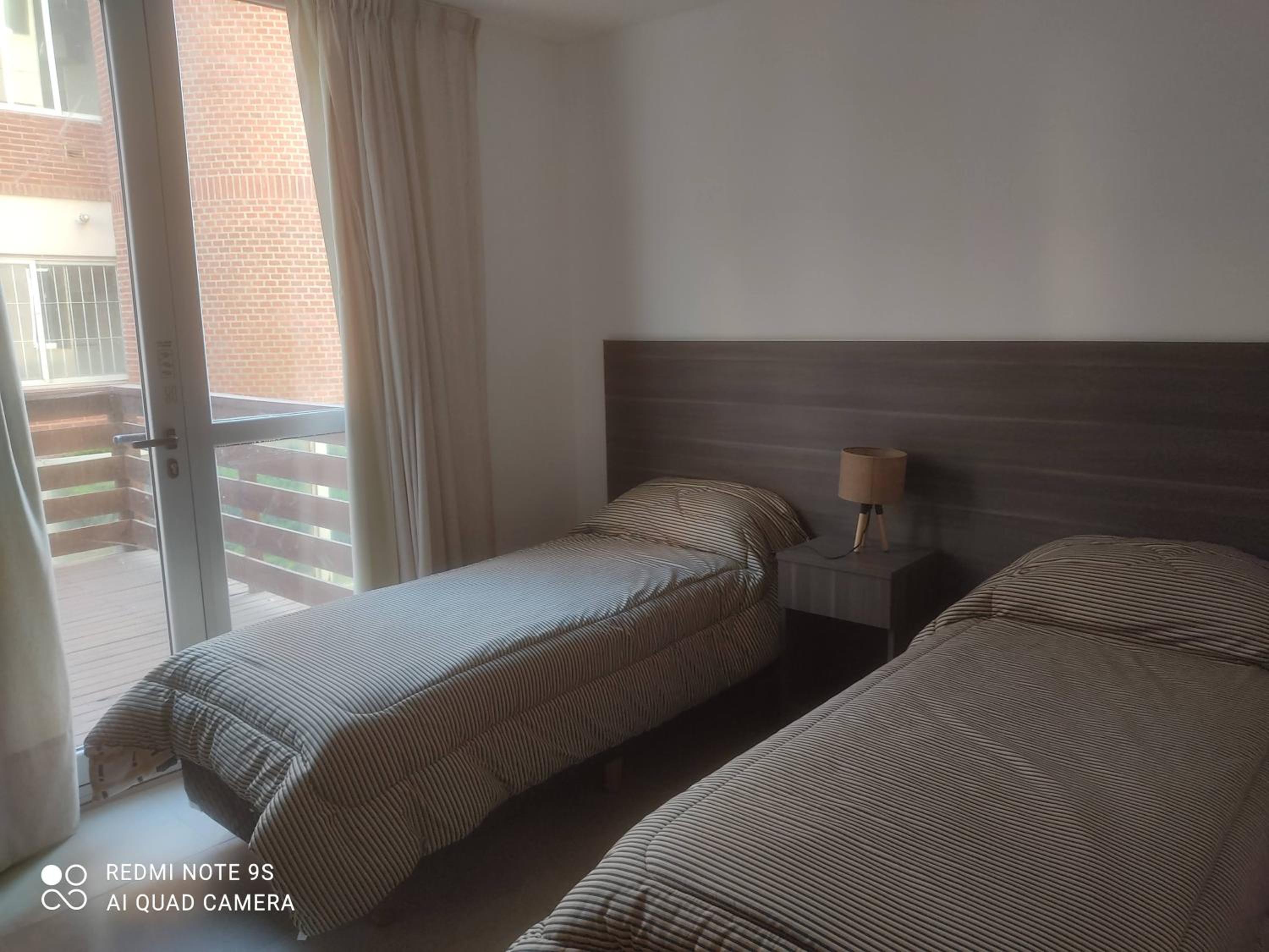 Three-Bedroom Apartment with Balcony photo 2