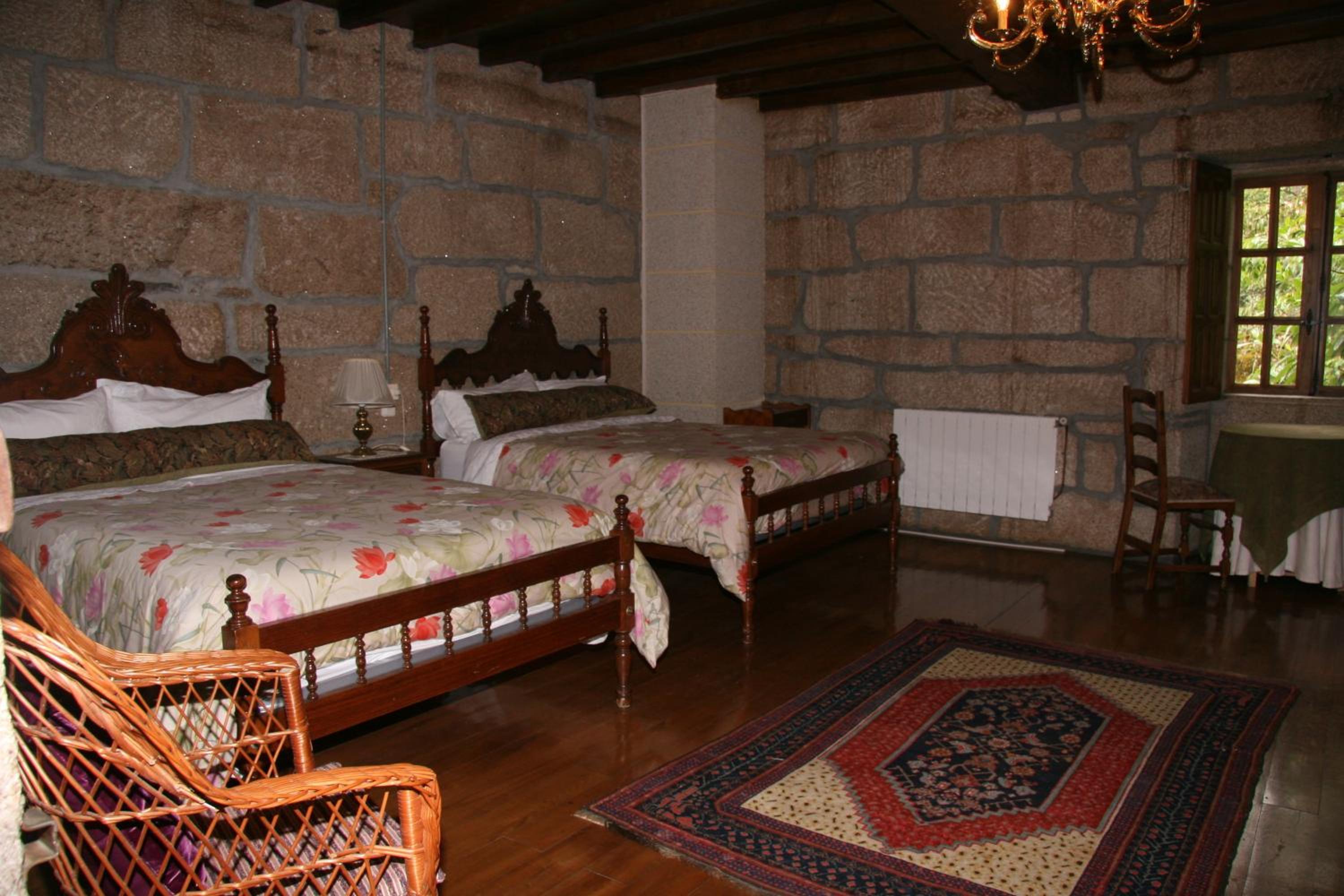 Habitación Doble Superior con Dos Camas Dobles