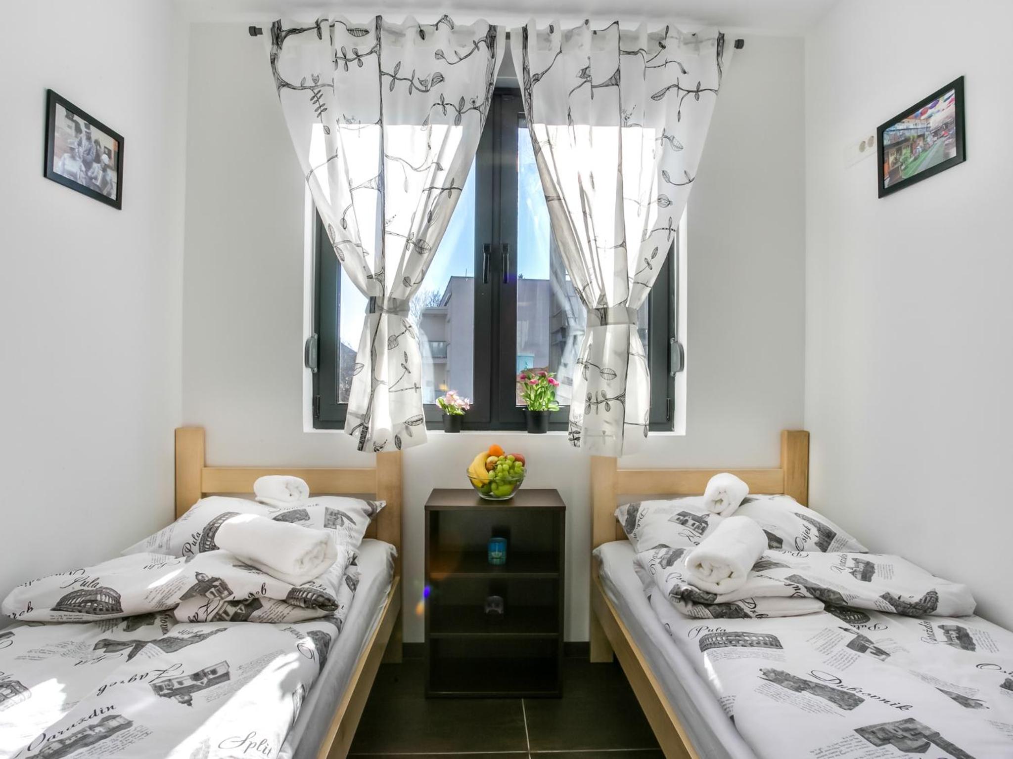 Twin Room - Photo 1