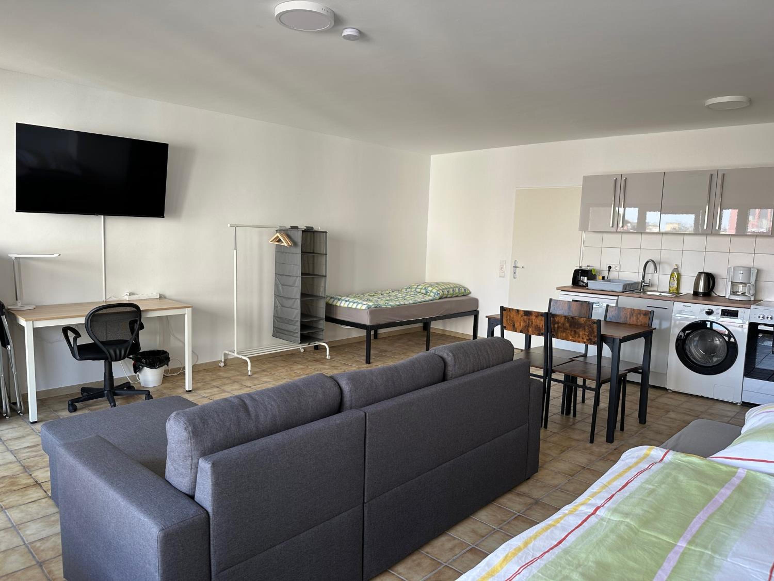 Three-Bedroom Apartment photo 1