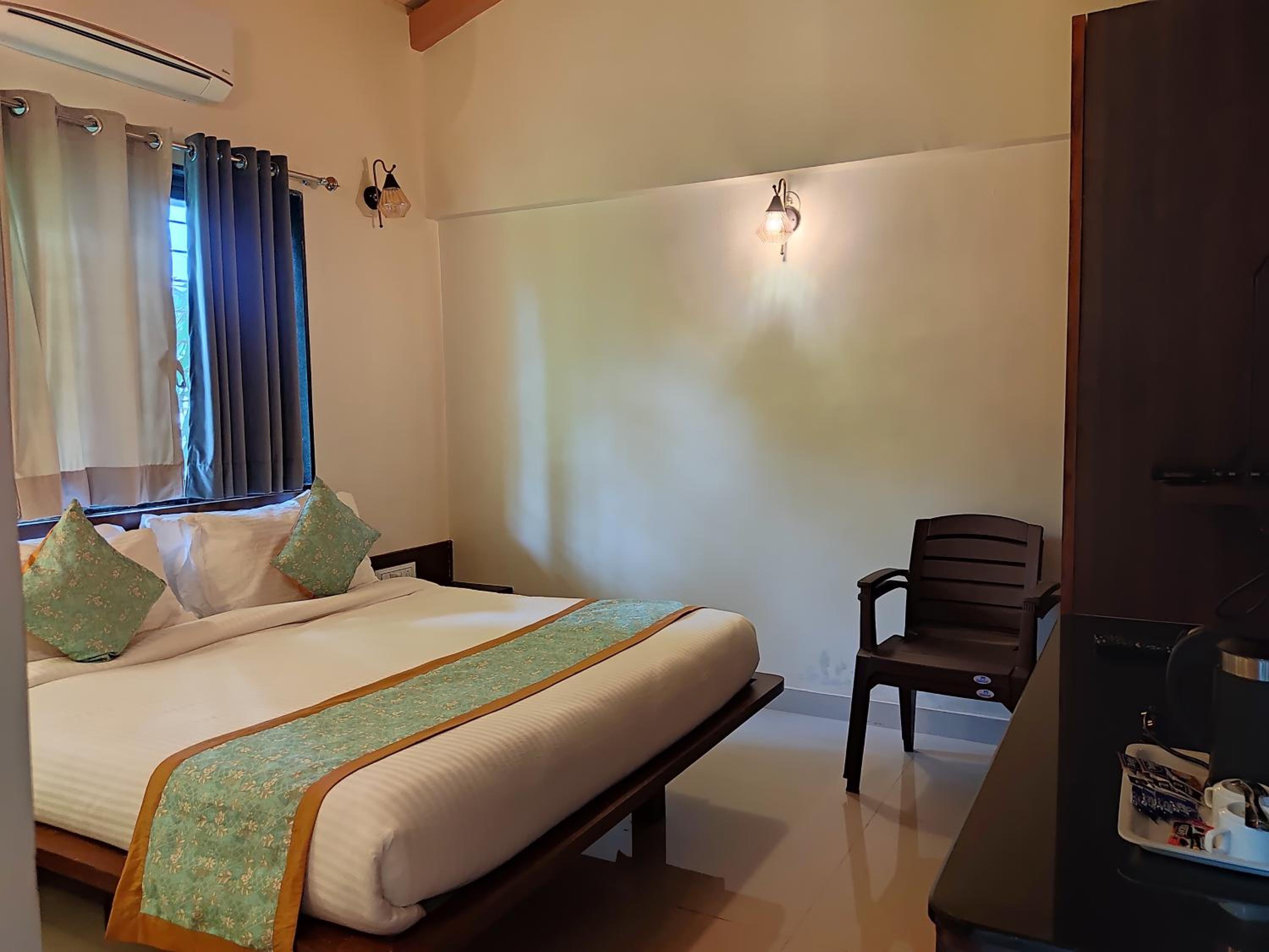 Deluxe Room - Photo 1