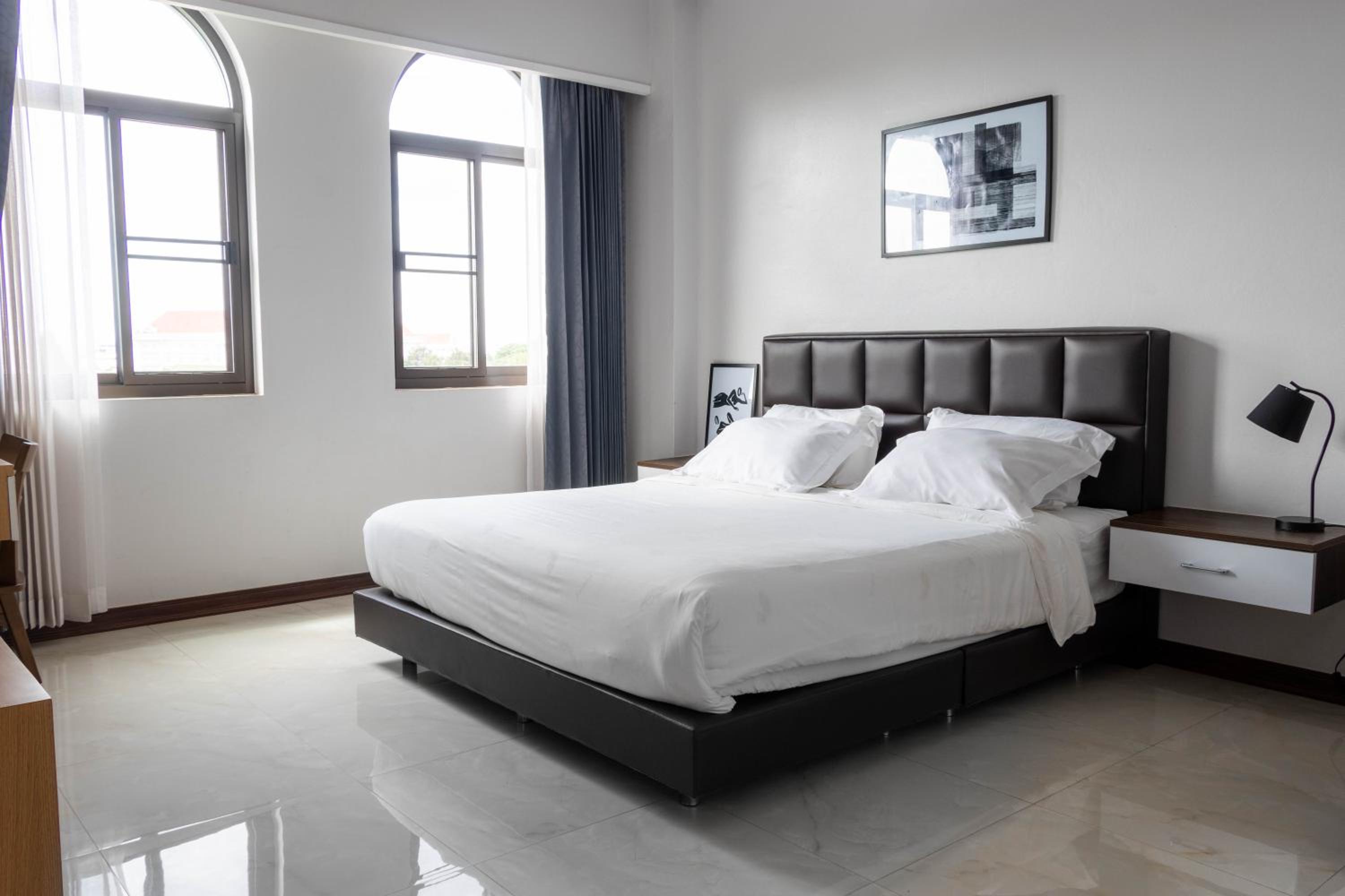 King Suite with Balcony - Photo 1