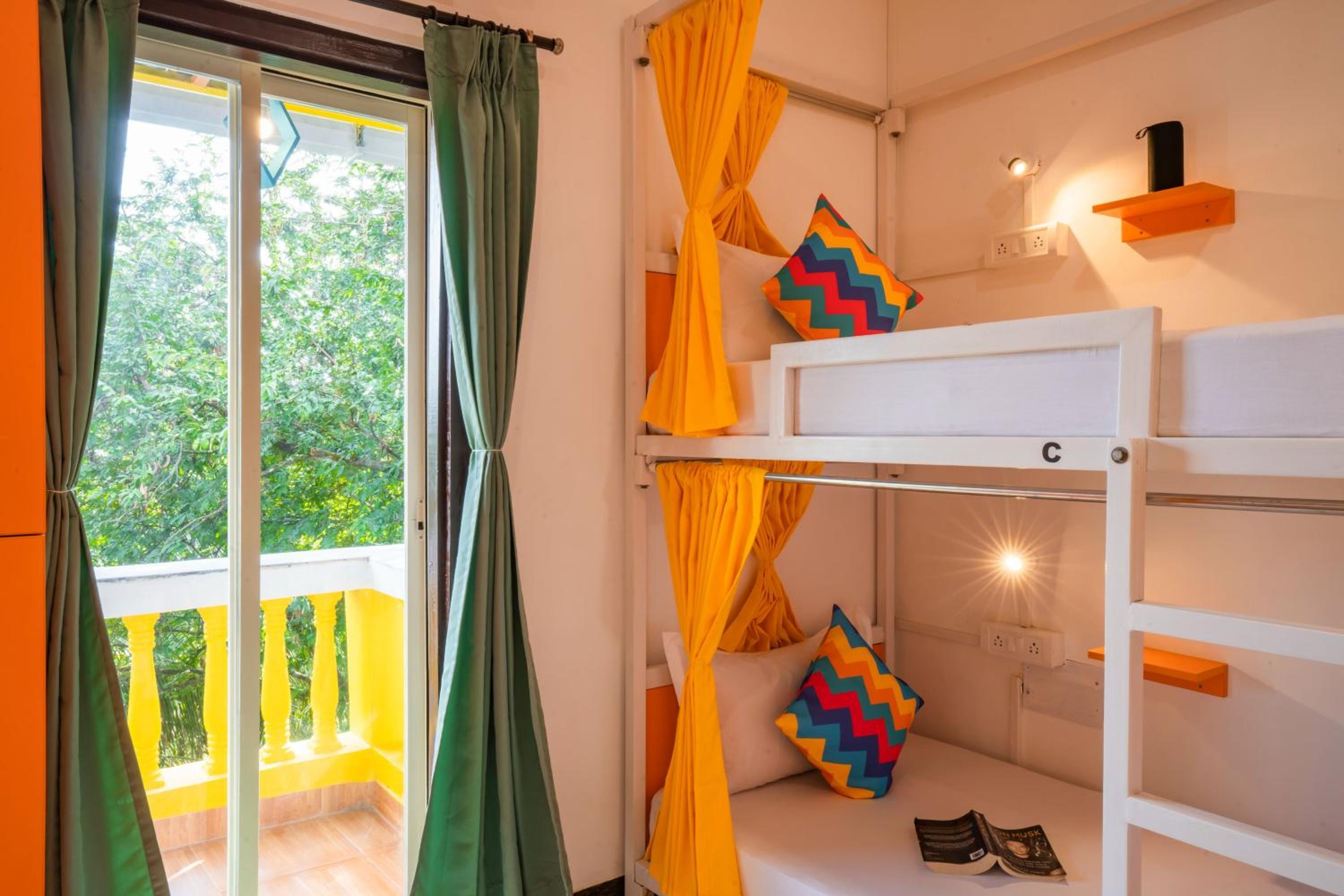 Bed in 8 Bed Mixed A/C Dormitory Room with Ensuite Bathroom photo 2