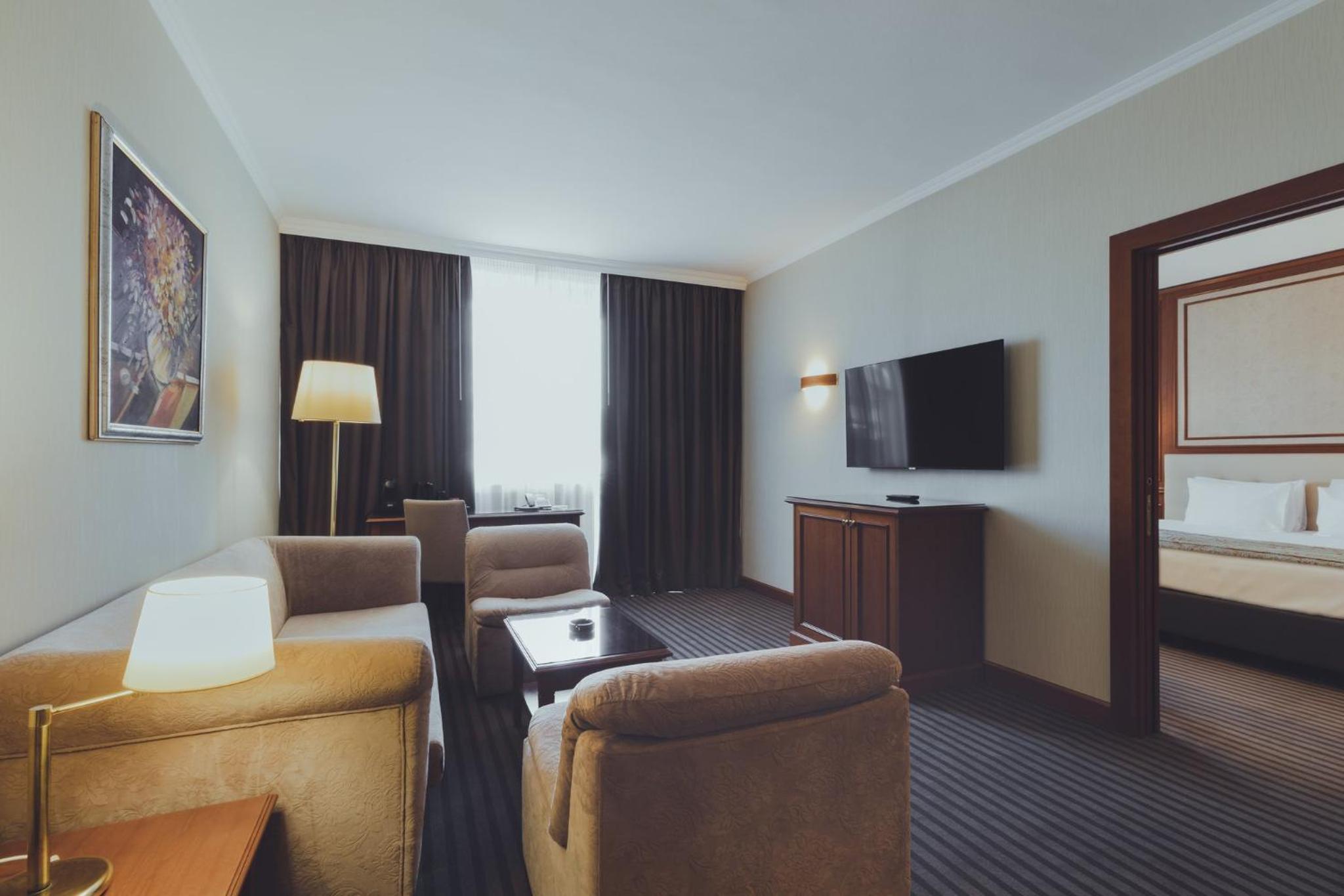 King Suite with Balcony - Photo 1
