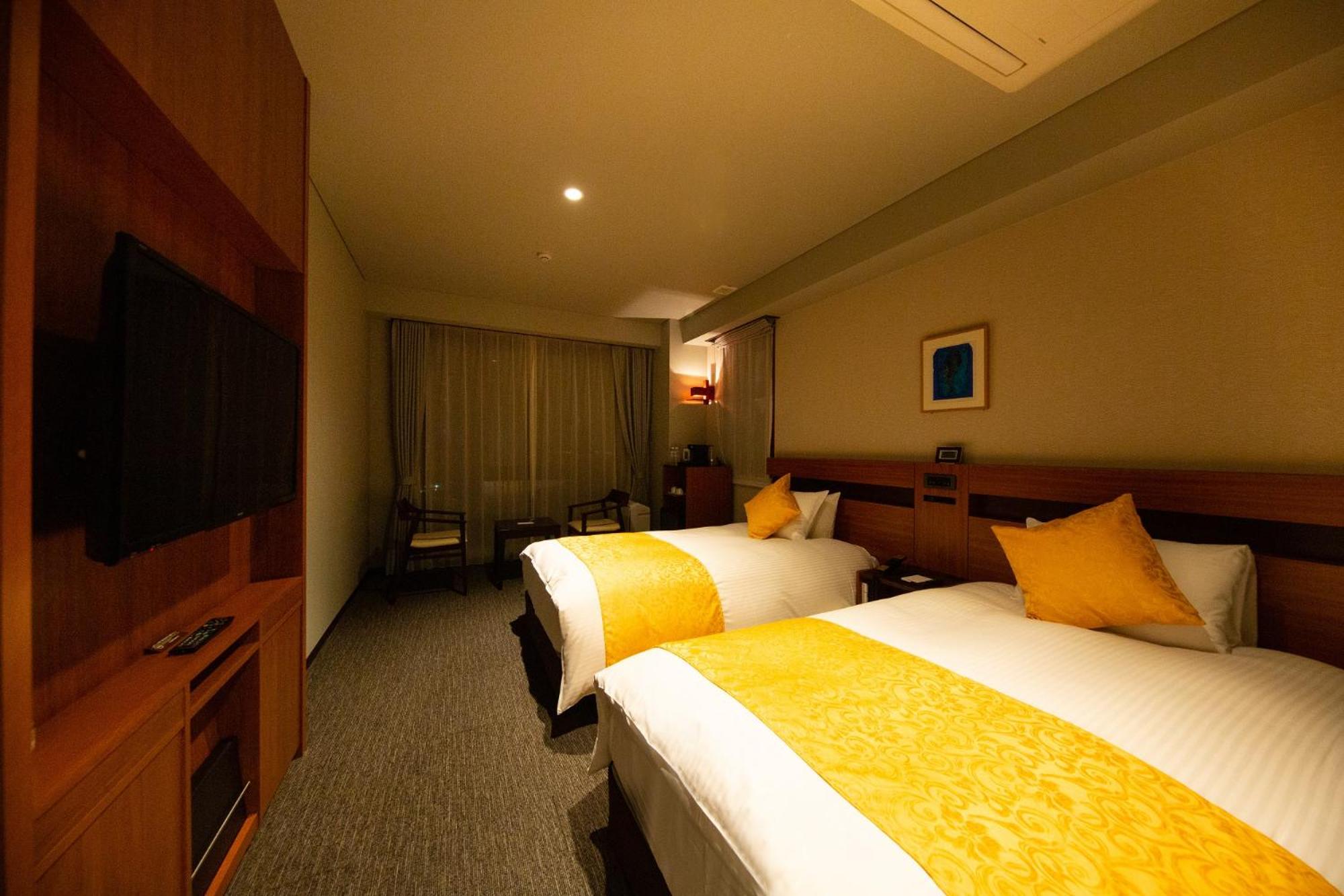 Standard Twin Room - Photo 4