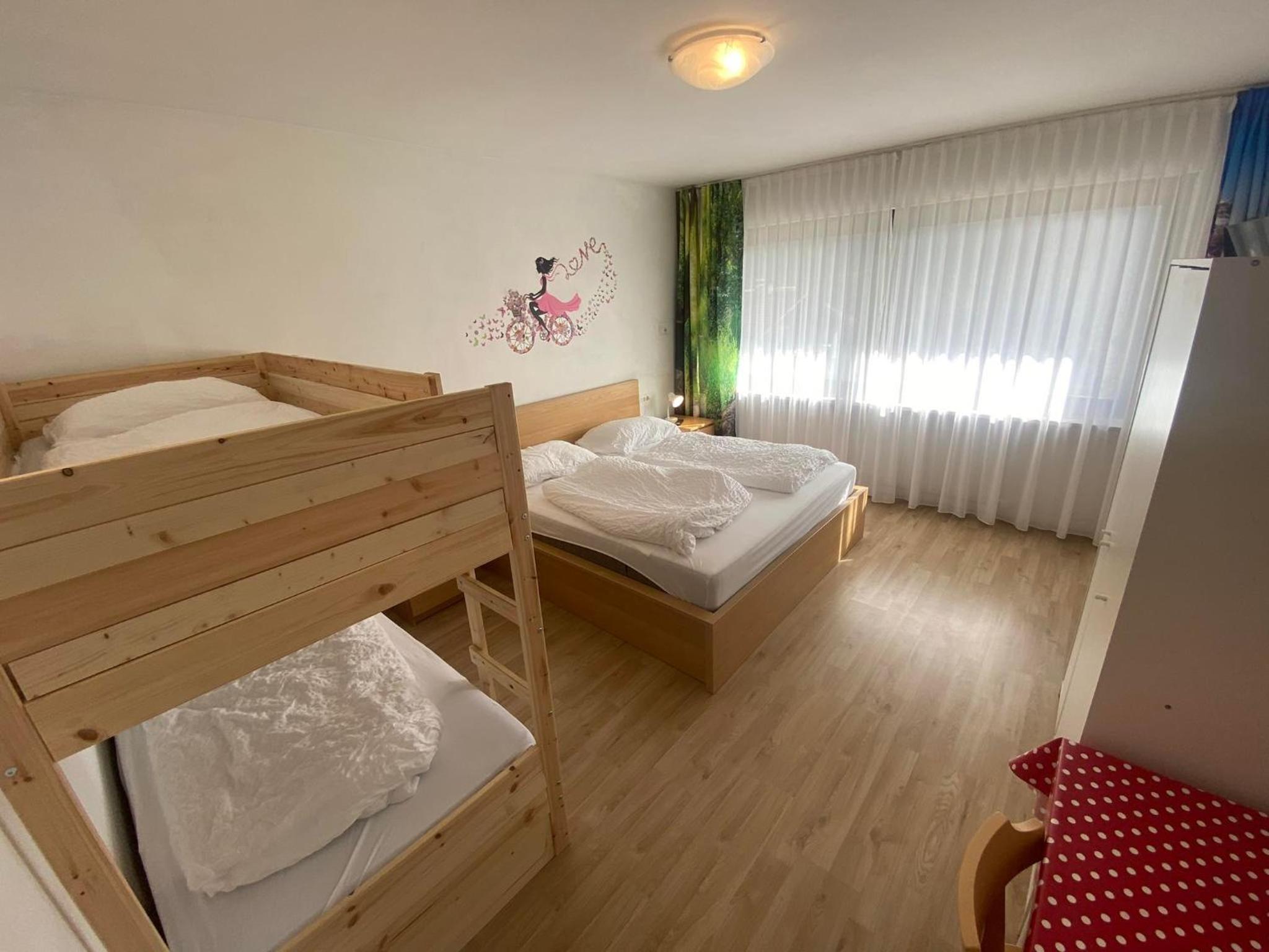 Quadruple Room with Balcony - Photo 13