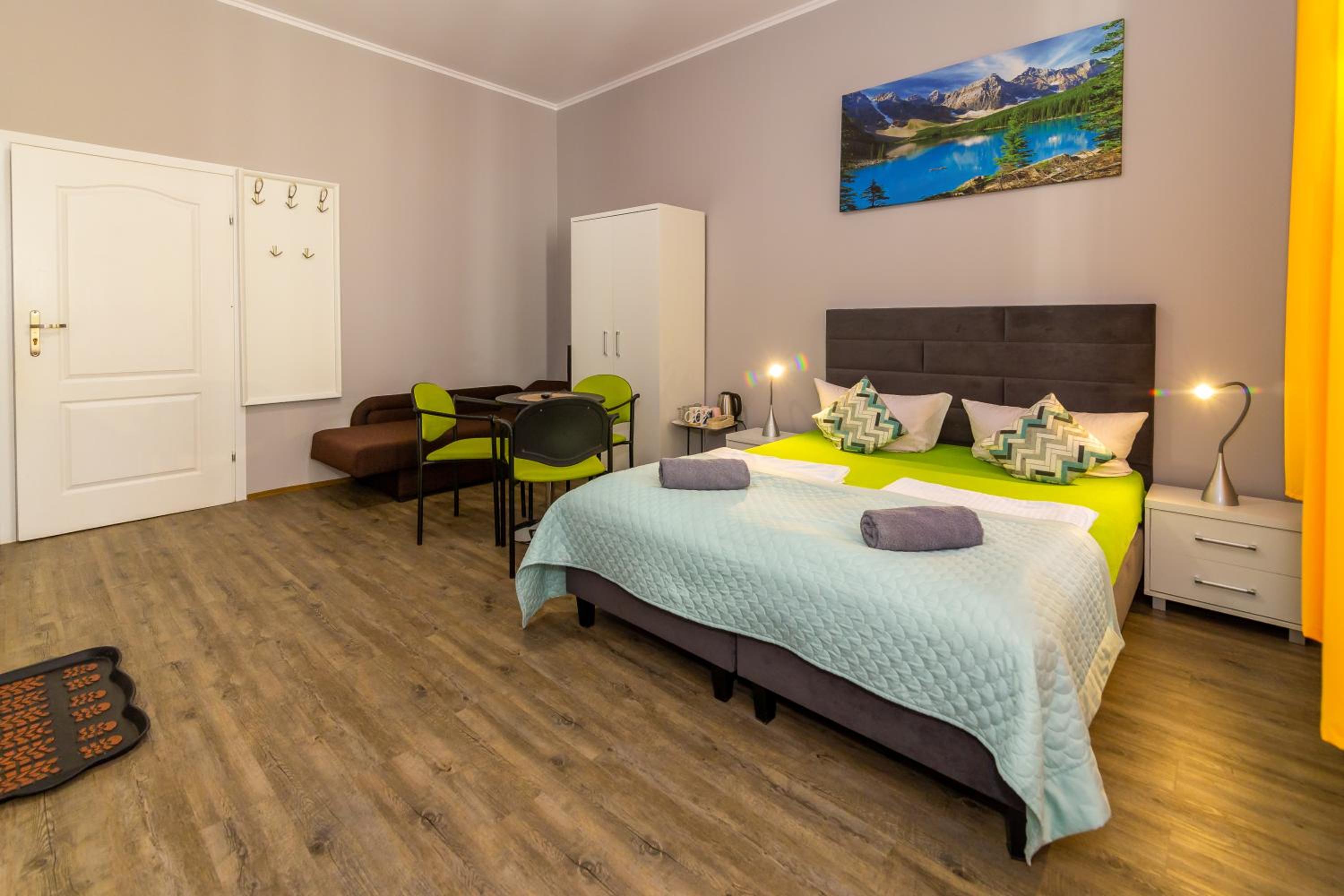 Quadruple Room with Balcony - Photo 1