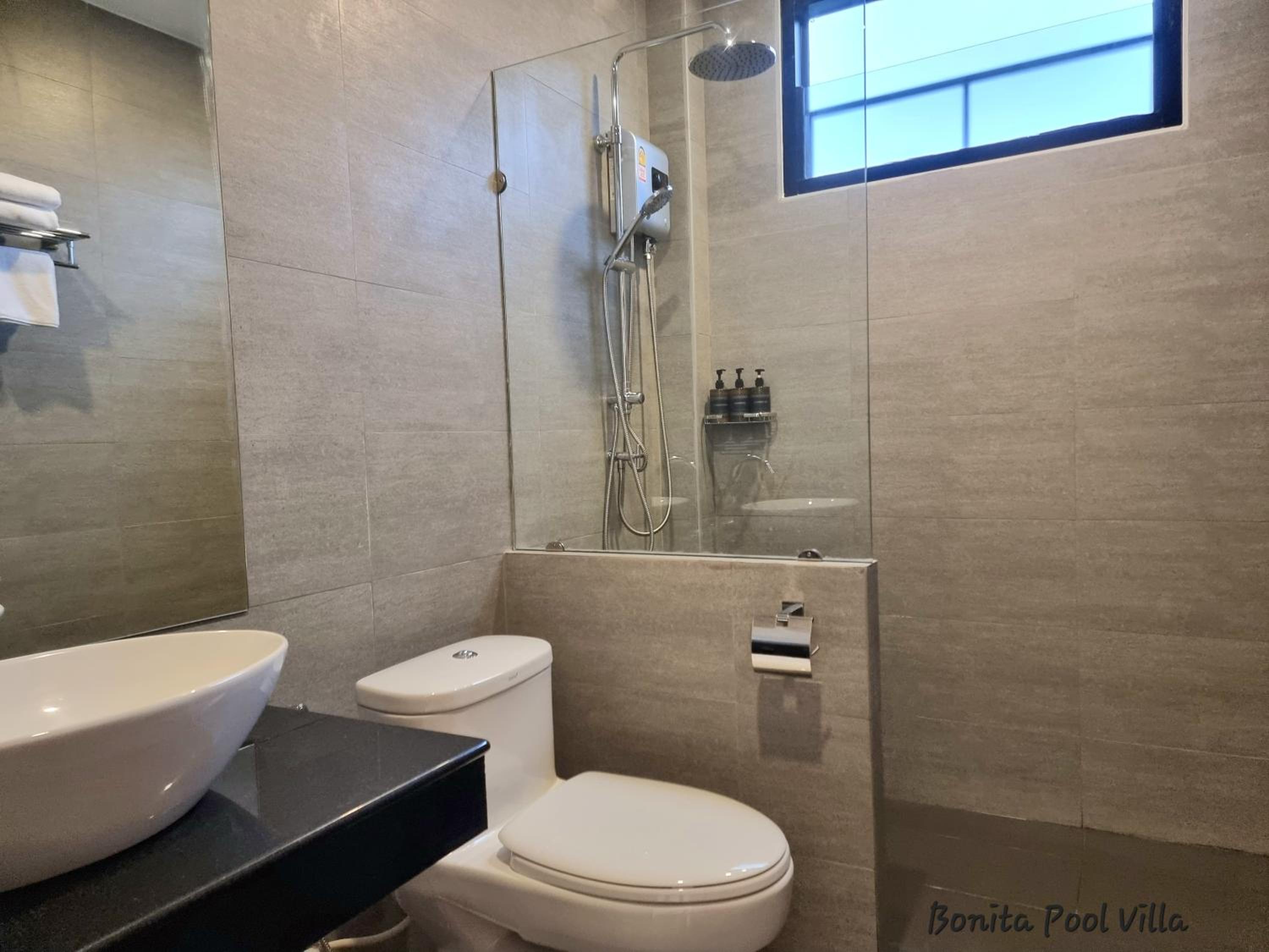 Four-Bedroom House - Photo 28