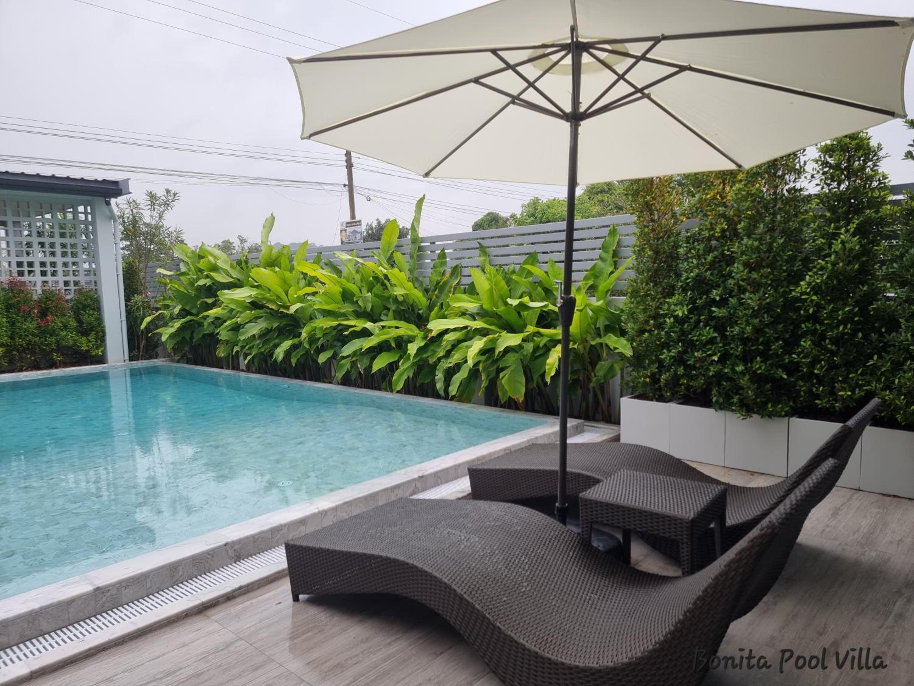 Four-Bedroom House - Photo 31