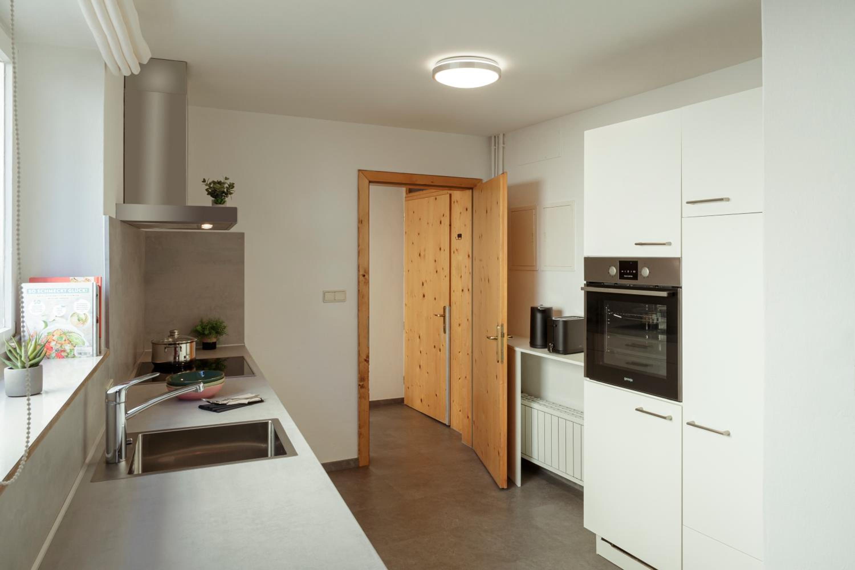 Three-Bedroom Apartment - Photo 11