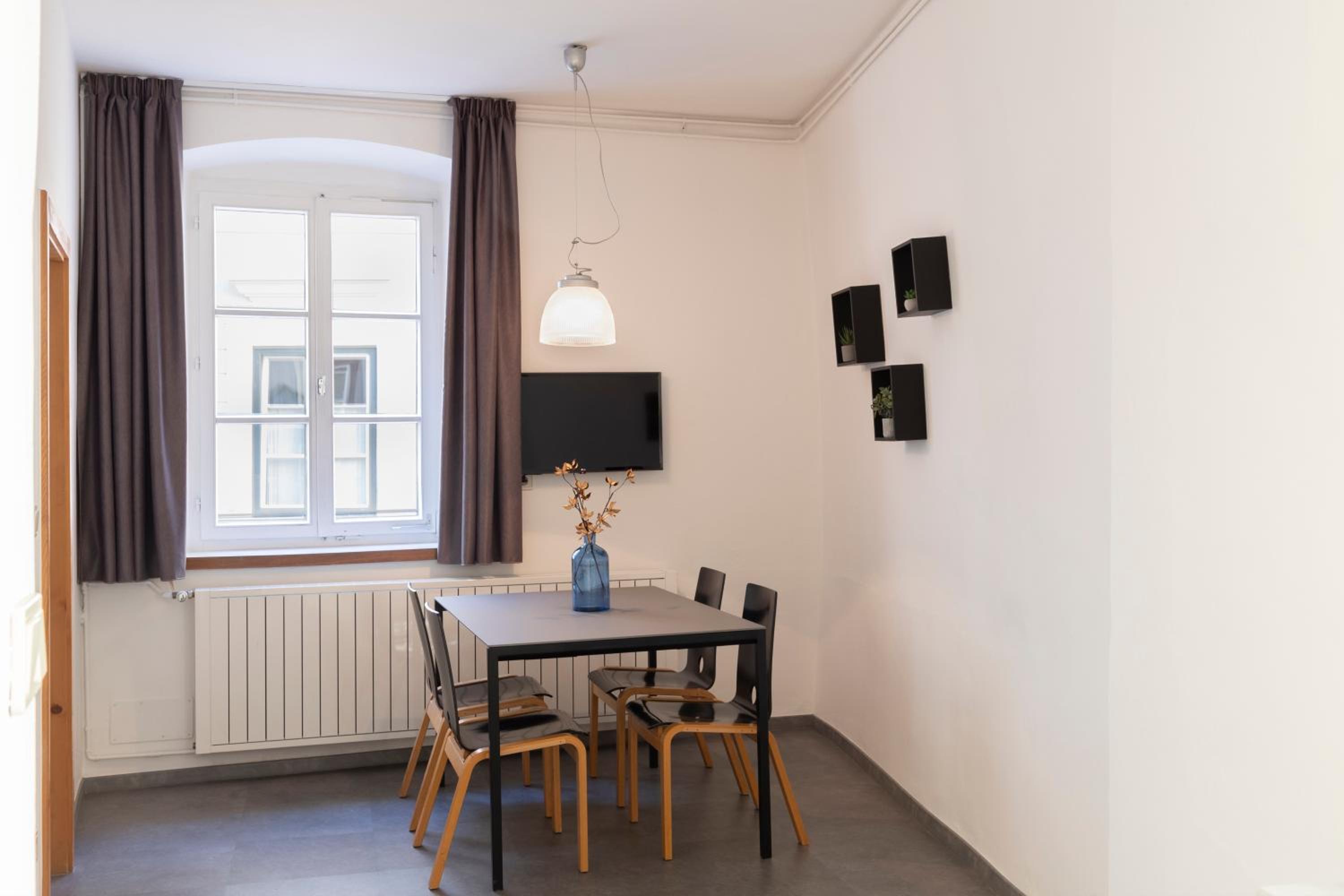 Three-Bedroom Apartment - Photo 2