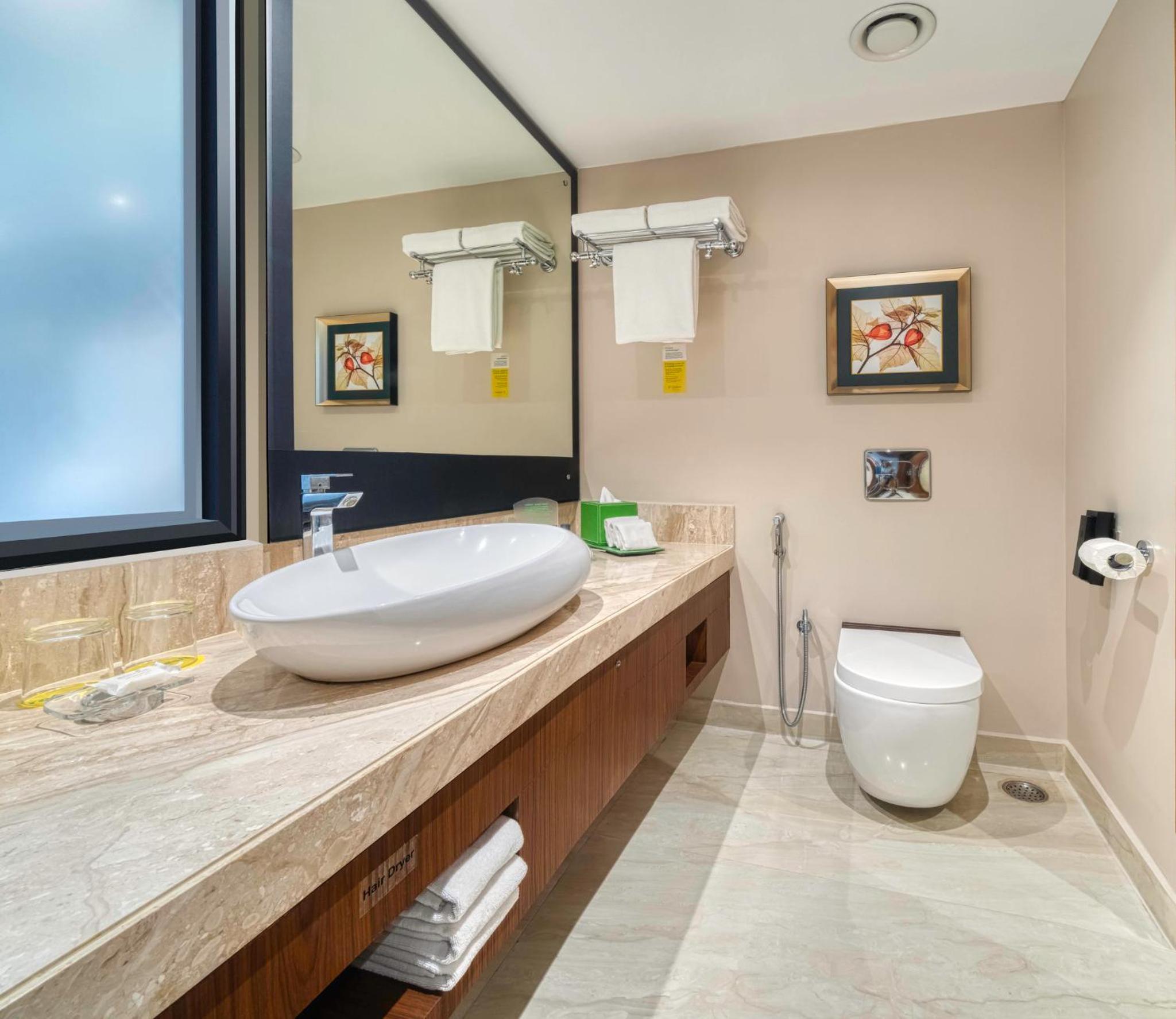 Standard Twin Room with Walk-In Shower - Enjoy 20% savings on Food & Beverages (soft), Happy Hours: Buy 1 Get 1 on IMFL (4PM – 8), Complimentary snacks with select liquor packages, Beer buckets starting from just ₹599, Special pricing on liquor bottles  photo 3