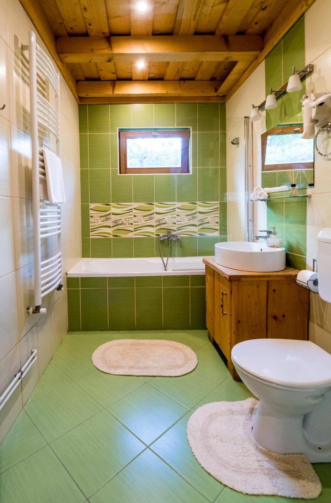 Three-Bedroom Apartment - Photo 12
