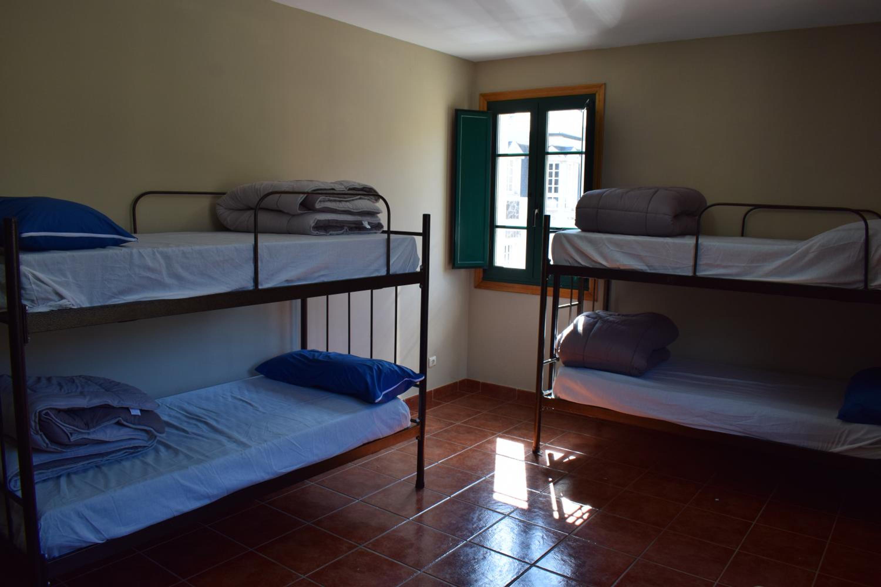 Cama en Habitación Compartida Mixta de 6 Camas