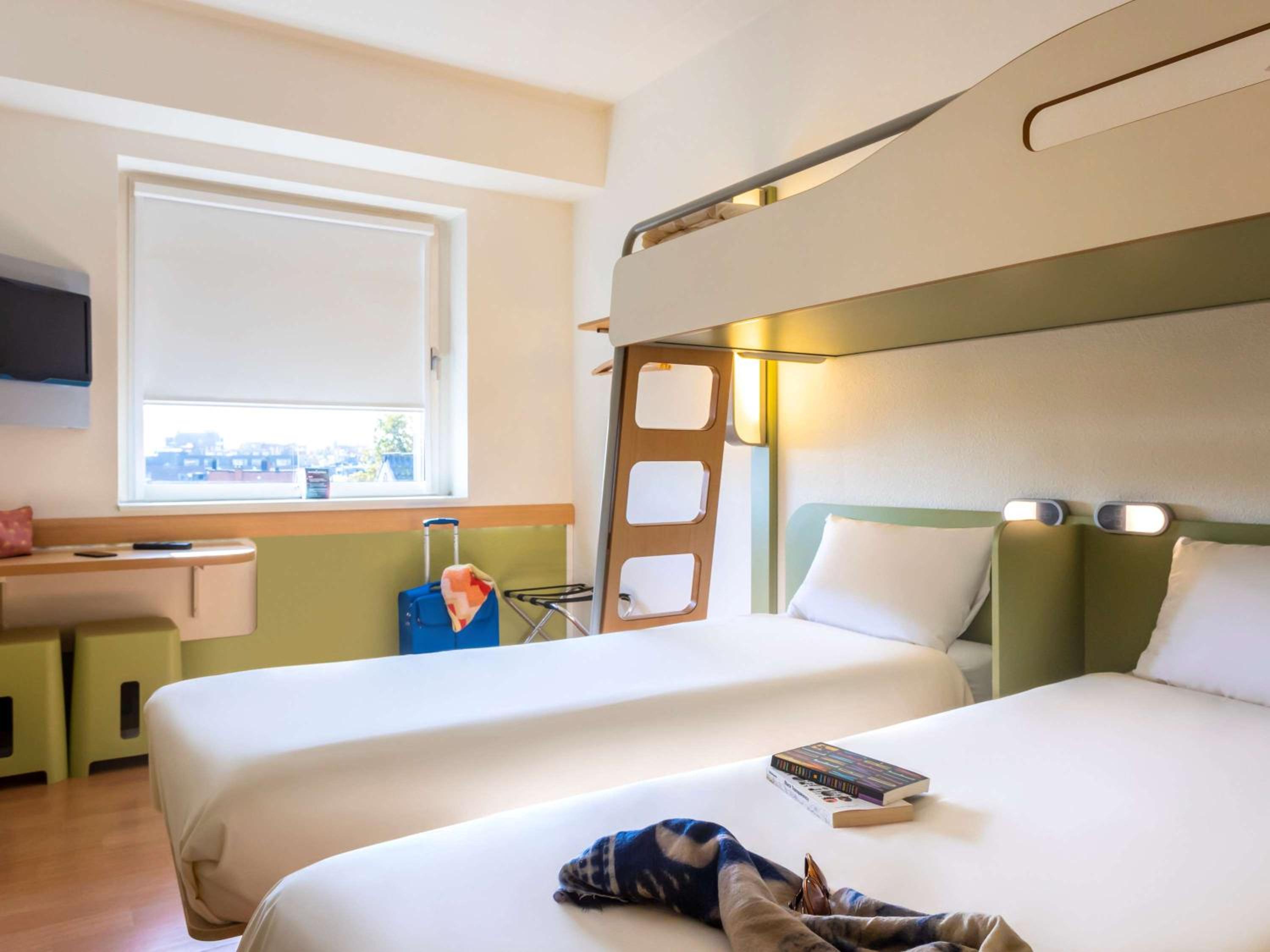 Standard Double Room with Two Single Beds and One Bunk Bed - Photo 1